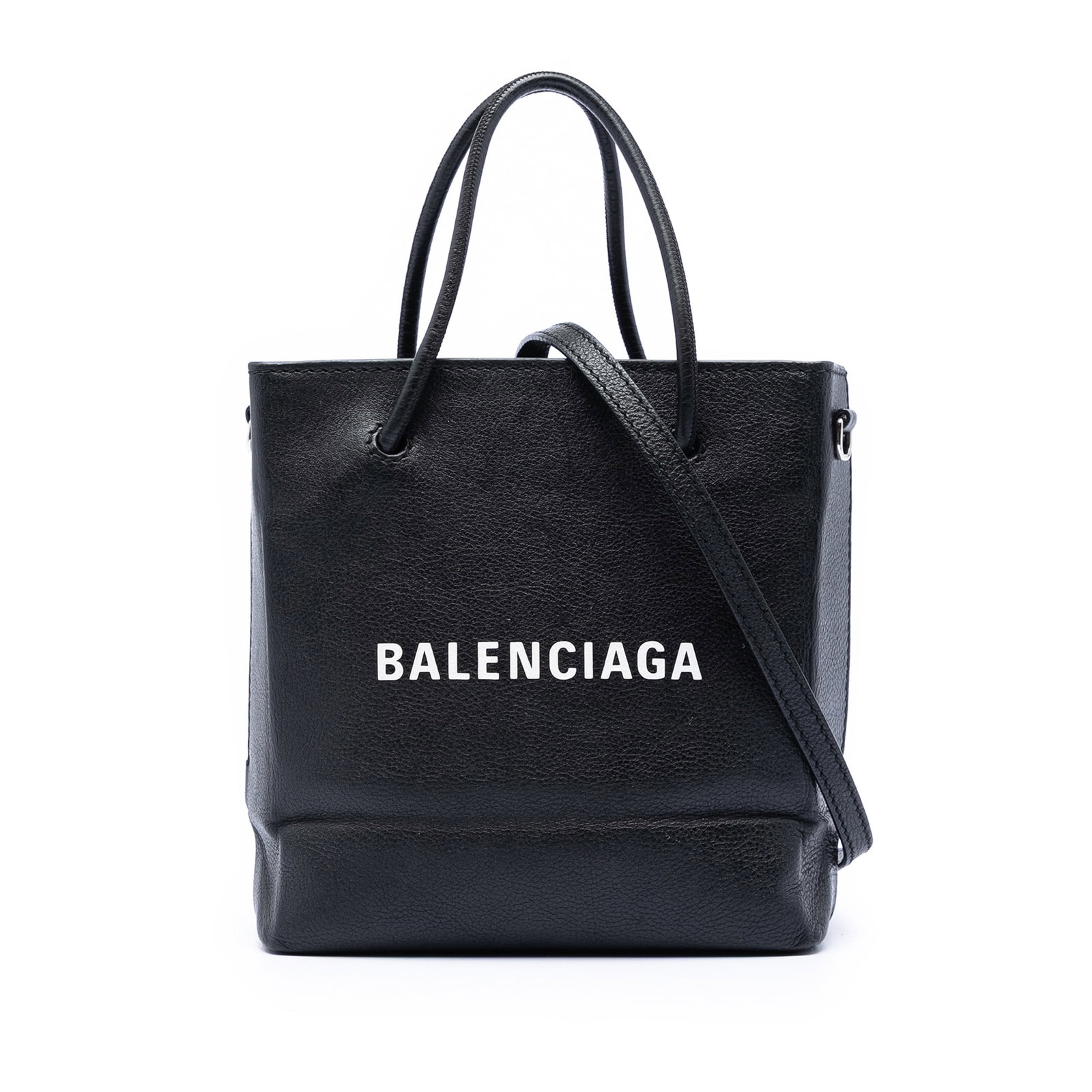 Balenciaga XXS Leather Tote with Shoulder Strap: Balenciaga XXS Leather Tote with Shoulder Strap This Balenciaga XXS Leather Shopping Tote showcases a structured silhouette crafted from black leather. It features rolled leather handles, a detachable