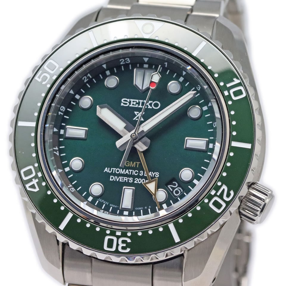 SEIKO Prospex 1968 Diver GMT SBEJ009 Men's Watch Stainless Steel Green Dial: SEIKO Prospex 1968 Diver GMT SBEJ009 Men's Watch Stainless Steel Green Dial Introducing the SEIKO Prospex 1968 Diver Scuba GMT SBEJ009, a remarkable men's wristwatch that embodies a modern design insp