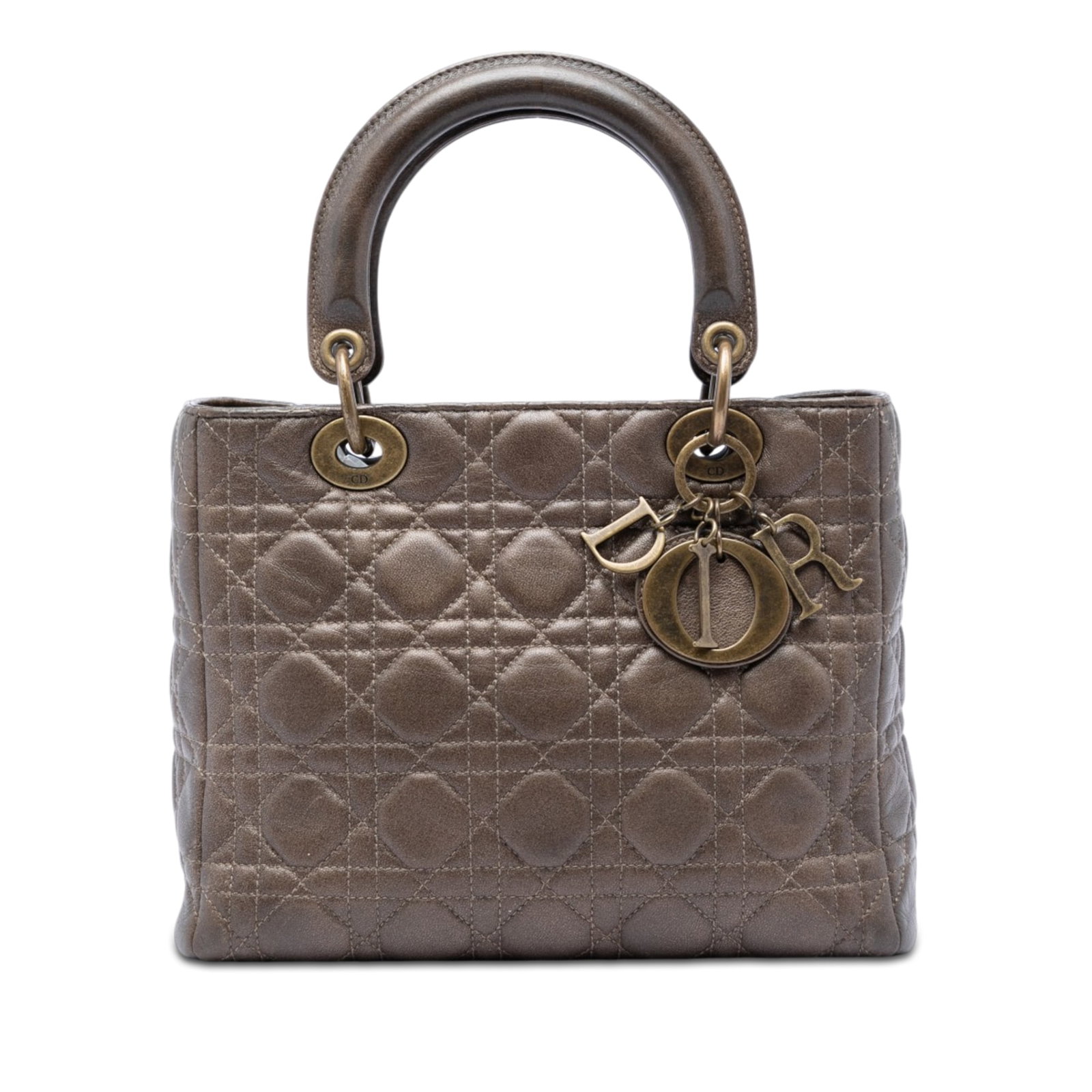 Dior Lady Dior Medium Cannage Metallic Lambskin Handbag: Dior Lady Dior Medium Cannage Metallic Lambskin Handbag A Medium Metallic Lambskin Cannage Lady Dior bag featuring a quilted lambskin leather body, flat leather top handles, a top zip closure, and an 
