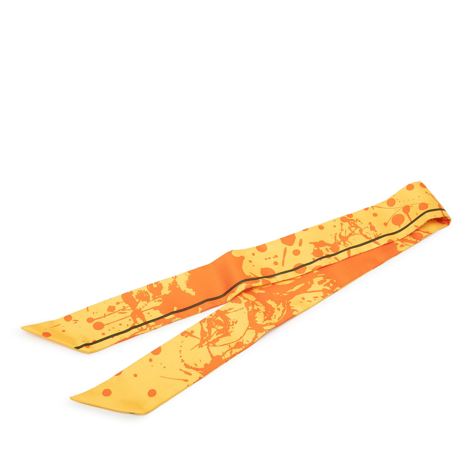 Hermes Orange Twilly Silk Scarf Paint Splatter 86 x 5 cm: Hermes Orange Twilly Silk Scarf Paint Splatter 86 x 5 cm This Hermes Twilly scarf showcases a vibrant Paint Splatter print on luxurious 100% silk. Crafted in France, it features an orange colorway and
