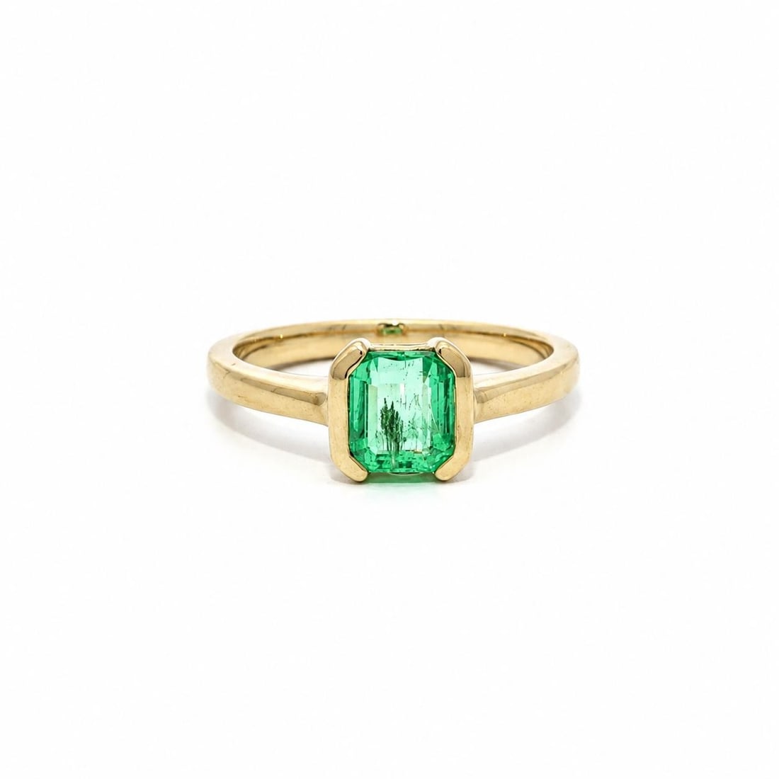 GIA Certified 0.97ct Colombian Emerald Solitaire Ring 18k Yellow Gold: GIA Certified 0.97ct Colombian Emerald Solitaire Ring 18k Yellow Gold Unbranded women's solitaire ring featuring a natural Colombian emerald in a half bezel setting. The emerald is GIA certified and d
