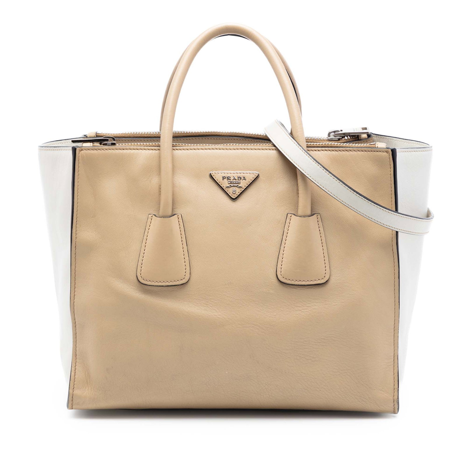 Prada Beige Bicolor Leather Double Zip Satchel: Prada Beige Bicolor Leather Double Zip Satchel This Prada Bicolor Glace Calf Twin Pocket Double Handle Satchel features a beige bicolor leather body with rolled leather handles and a detachable flat l