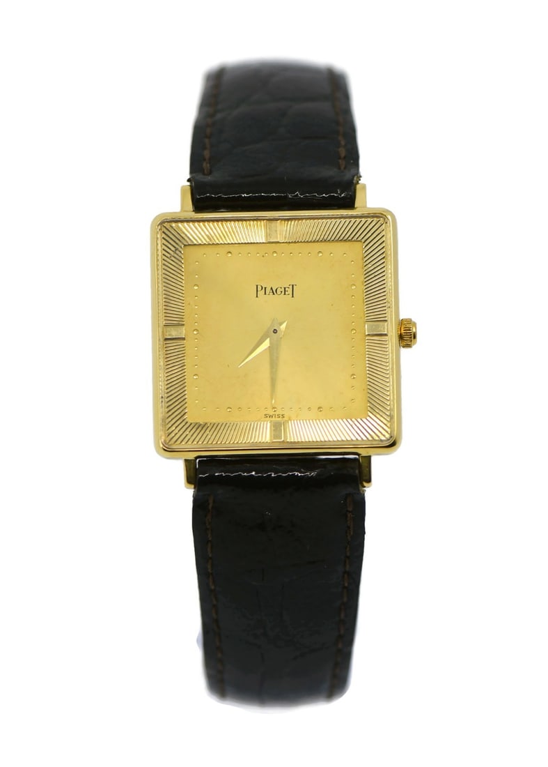 Piaget Vintage 18K Yellow Gold Analog Watch Ref 9121: Piaget Vintage 18K Yellow Gold Analog Watch Ref 9121 Experience the elegance of this Piaget Vintage 18K Yellow Gold Watch, featuring a luxurious gold dial and a classic analog display. This exquisite 