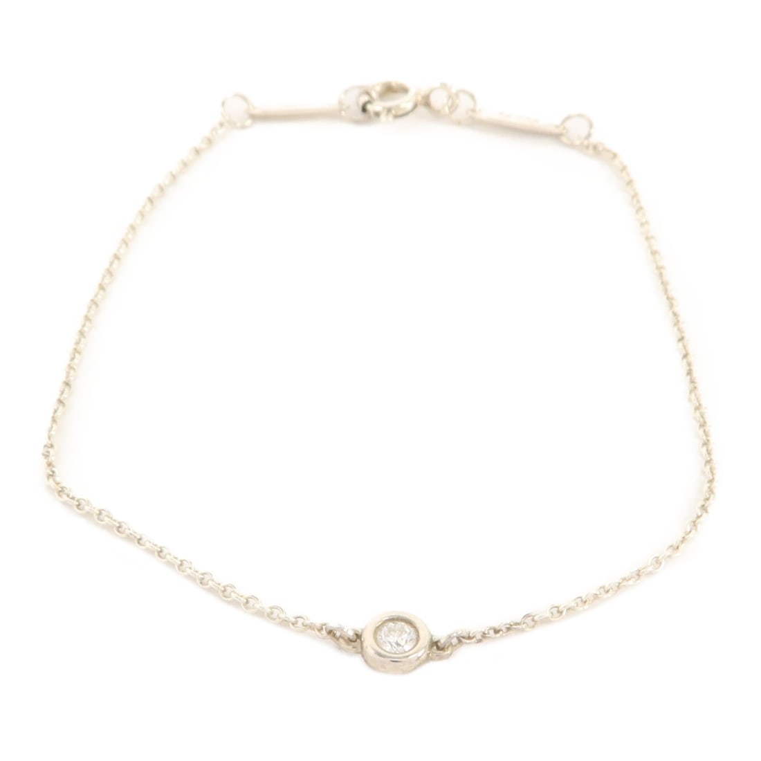 Tiffany Co Elsa Peretti Bracelet 925 Sterling Silver Diamond By the Yard: Tiffany Co Elsa Peretti Bracelet 925 Sterling Silver Diamond By the Yard A Tiffany & Co. Elsa Peretti Diamond By the Yard bracelet in 925 sterling silver. The piece is silver in color and is described