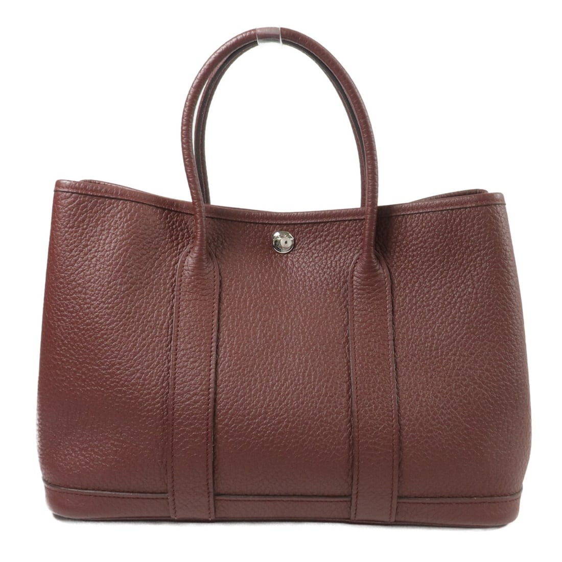 Hermes Garden Party TPM Bordeaux Country Leather Calfskin Tote: Hermes Garden Party TPM Bordeaux Country Leather Calfskin Tote Hermes Garden Party TPM handbag in Bordeaux color, made from country leather and calfskin (cowhide). It features a hook button closure, o