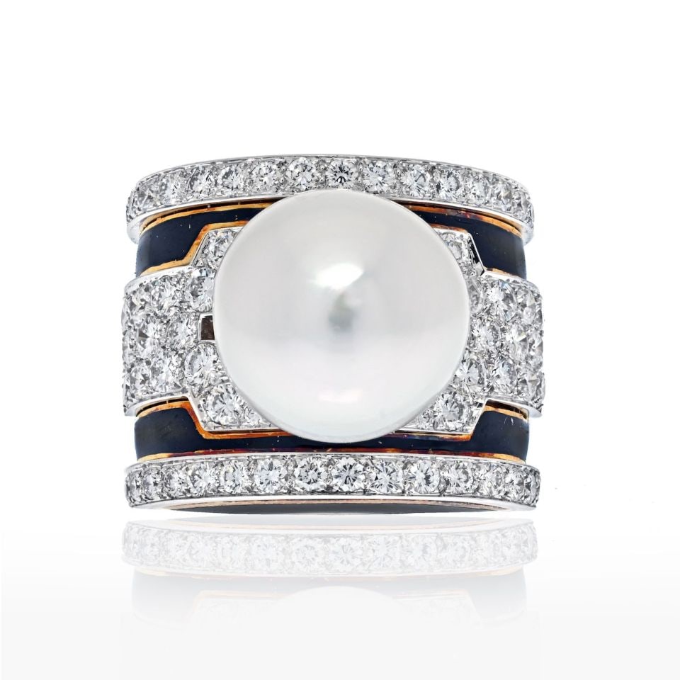 David Webb Pearl Diamond Black Enamel Ring Platinum 18K Gold: David Webb Pearl Diamond Black Enamel Ring Platinum 18K Gold This exquisite David Webb ring features a striking combination of platinum and 18K yellow gold, harmonizing bold design with feminine elega