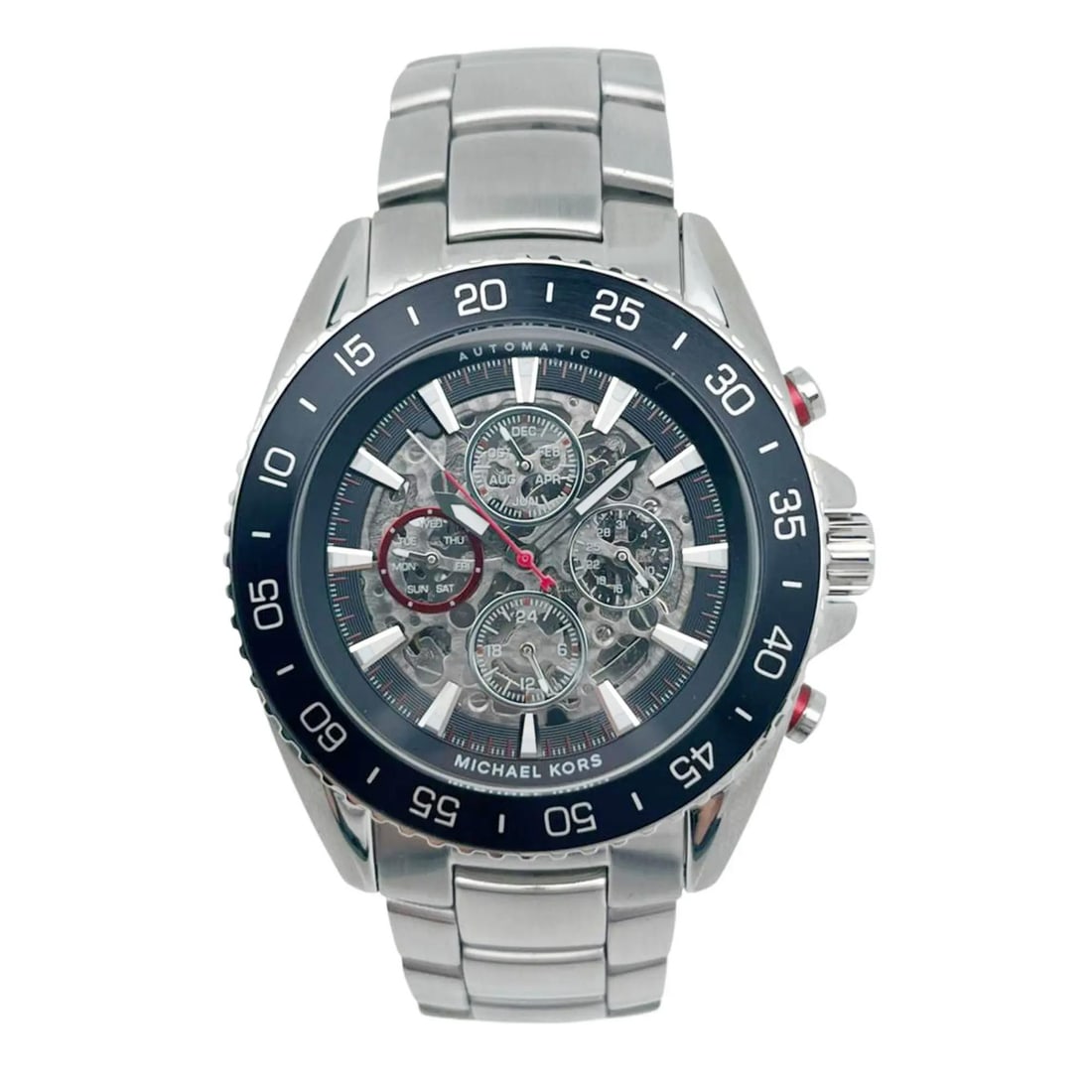Michael Kors Jetmaster MK9011 Black Skeleton Dial Men's Automatic Watch: Michael Kors Jetmaster MK9011 Black Skeleton Dial Men's Automatic Watch Elevate your style with the Michael Kors Jetmaster Steel Black Skeleton Dial Men's Automatic Watch MK9011. This sophisticated wr