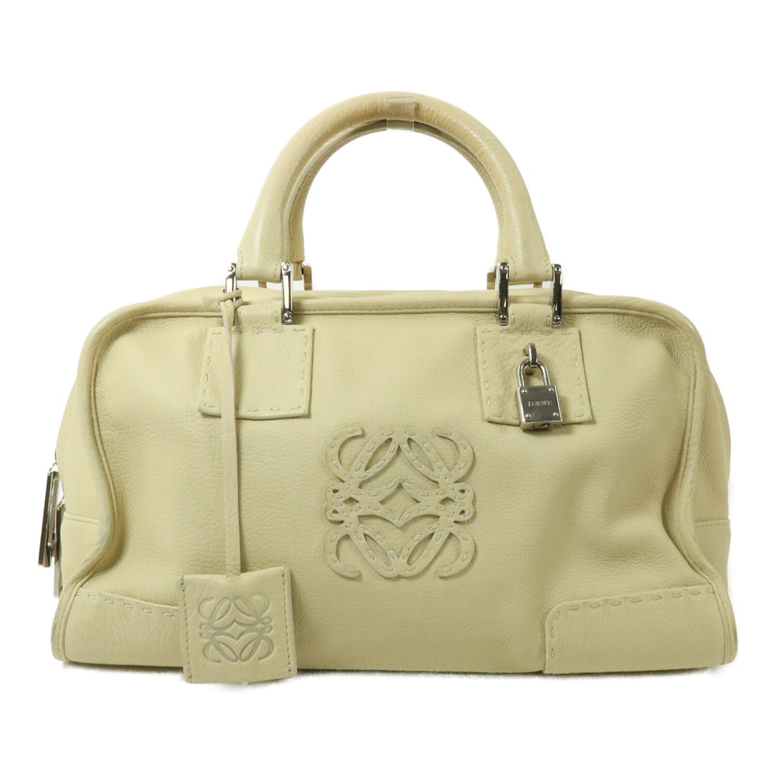 LOEWE Amazona 28 Calfskin Handbag 311.77.001 Beige: LOEWE Amazona 28 Calfskin Handbag 311.77.001 Beige This LOEWE Amazona 28 handbag is crafted from calfskin leather in an ivory/beige color. It features a regular size profile, a handle drop of 30 cm, a