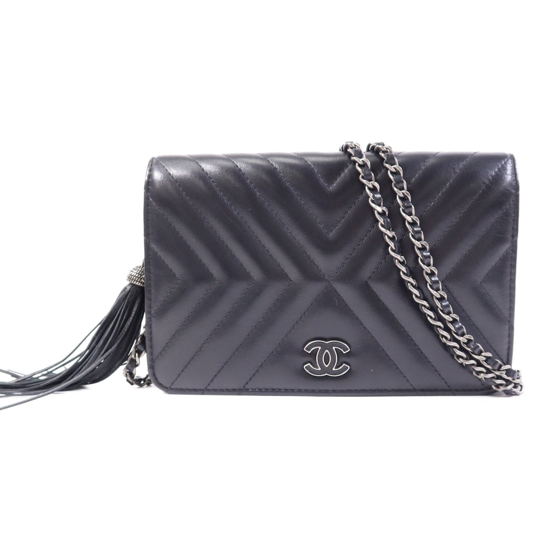 CHANEL WOC CC black calfskin shoulder wallet with chain SHW: CHANEL WOC CC black calfskin shoulder wallet with chain SHW A CHANEL Wallet on Chain shoulder bag in black calfskin leather. The bag features a black-on-black colorway, a chain shoulder strap, and a p