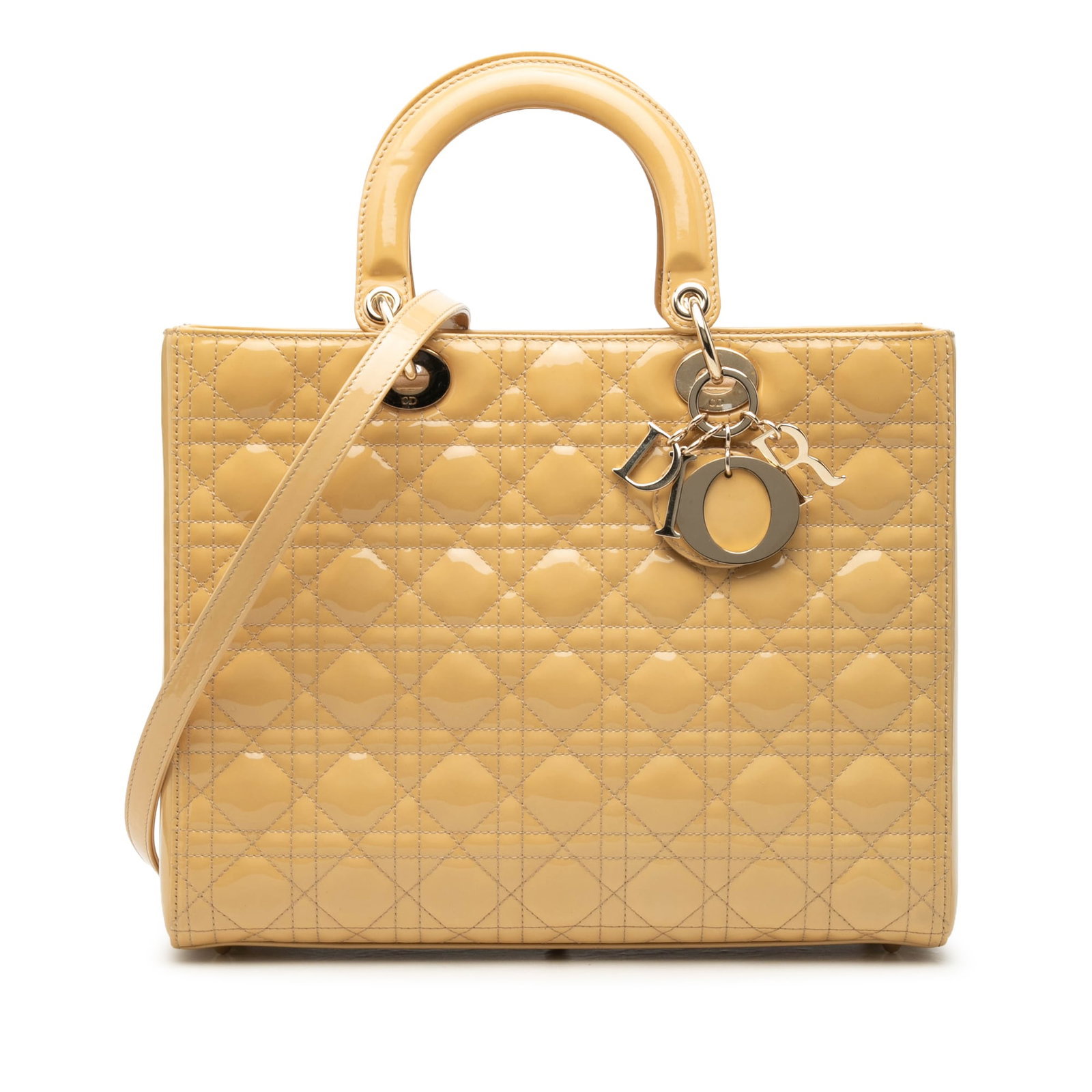 Dior Lady Dior Large Cannage Patent Leather Handbag: Dior Lady Dior Large Cannage Patent Leather Handbag The Lady Dior is a large bag featuring a patent leather body, flat leather handles, a detachable flat leather strap, a top zip closure, and an inter