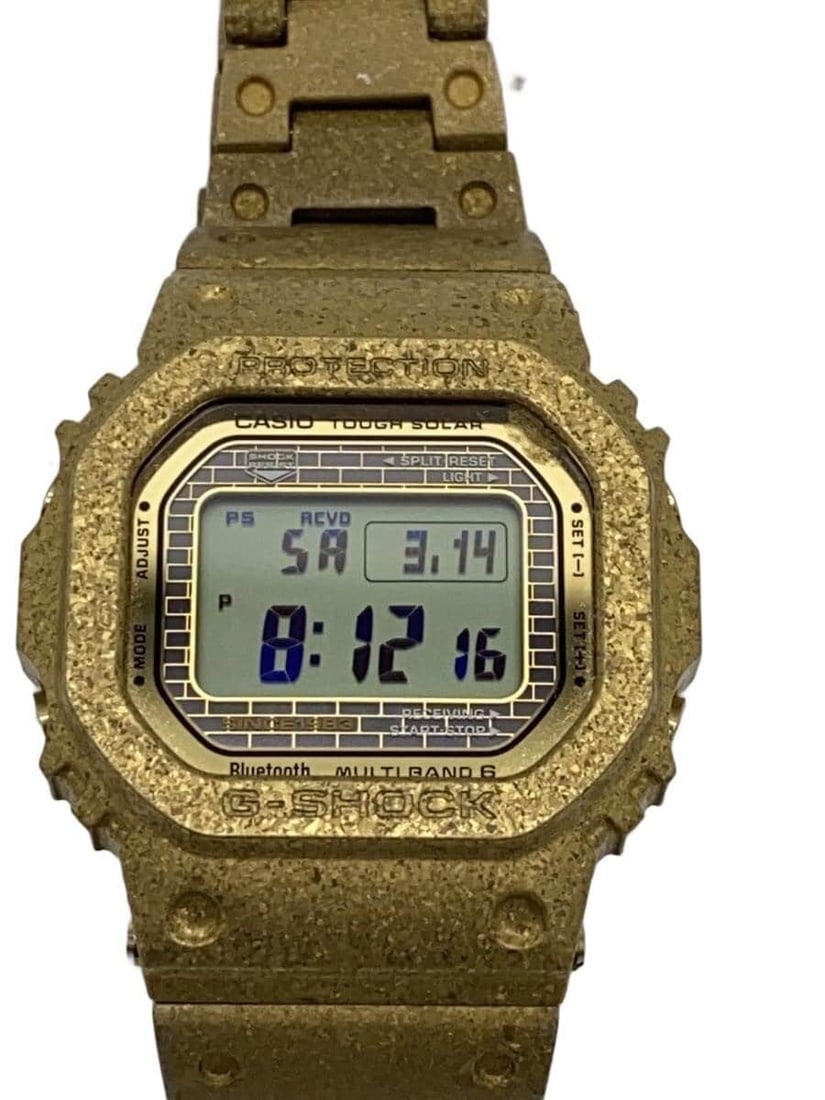 Casio G Shock GMW B5000PG 9JR Men's Wristwatch: Casio G Shock GMW B5000PG 9JR Men's Wristwatch This CASIO G-SHOCK GMW-B5000PG-9JR is a men's wristwatch from Japan, featuring a durable design and slightly used condition. The watch offers precise dim