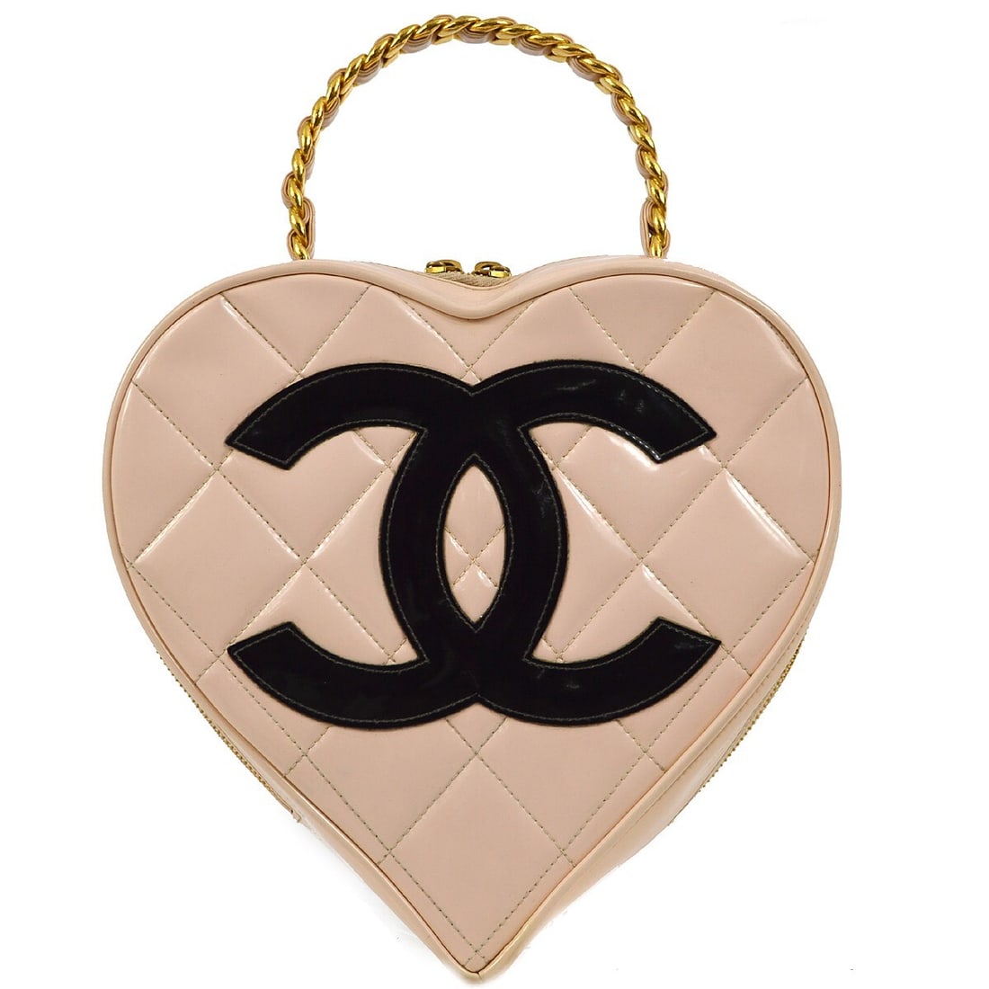 CHANEL Quilted Heart Vanity Handbag in Light Pink Patent Leather: CHANEL Quilted Heart Vanity Handbag in Light Pink Patent Leather Chanel heart vanity handbag in light pink patent leather with a quilted matelasse design and top handle. This medium bag features a zip