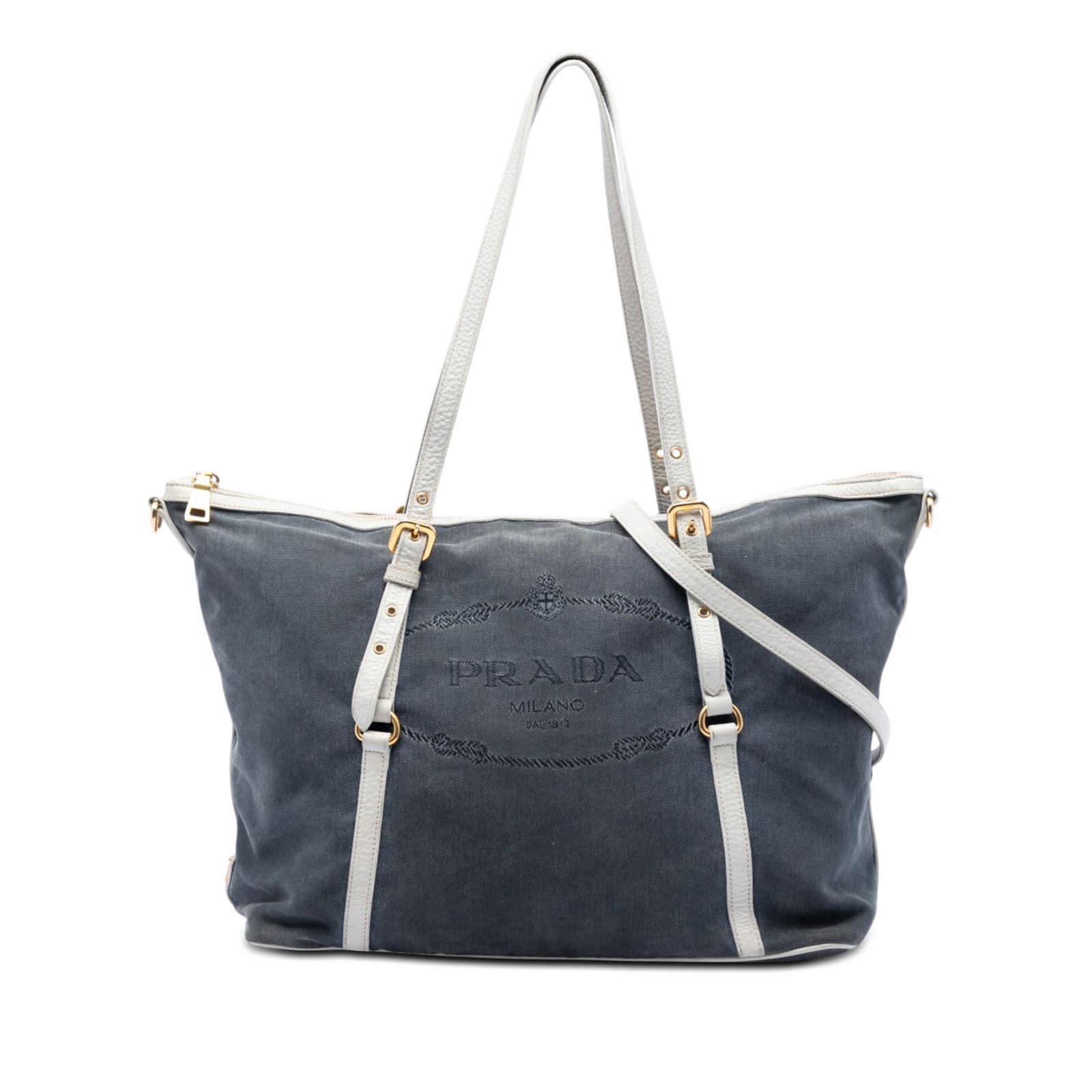 Prada Canapa Logo Canvas Satchel with Leather Trim Blue: Prada Canapa Logo Canvas Satchel with Leather Trim Blue Prada Canvas Canapa Logo Satchel in blue fabric with leather trim. This satchel features adjustable flat leather handles, a detachable and adjus
