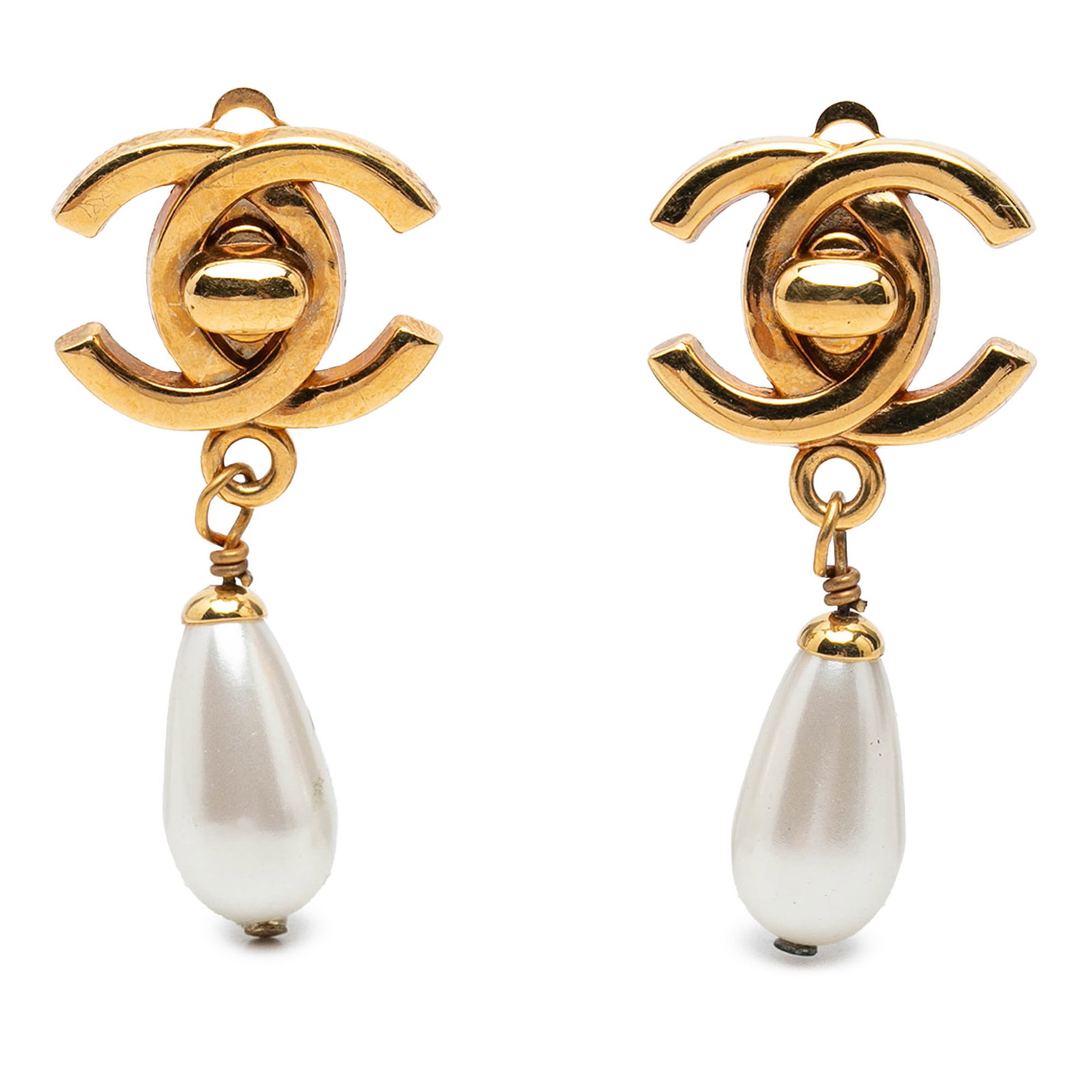 Chanel CC Turn Lock Faux Pearl Gold Plated Clip Earrings: Chanel CC Turn Lock Faux Pearl Gold Plated Clip Earrings Chanel CC Gold Plated Faux Pearl Drop Turn Lock Clip On Earrings in a costume jewelry style, made with gold plated metal and faux pearl body. T