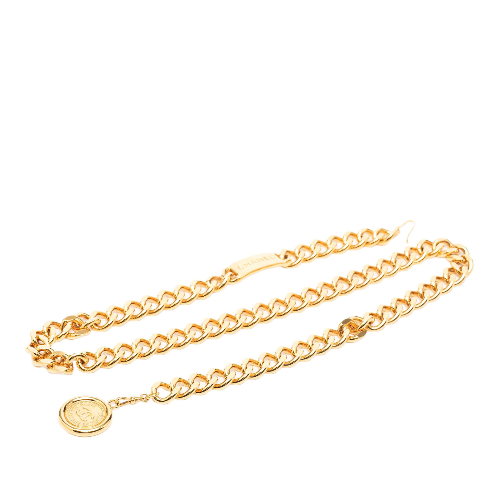 Chanel CC Medallion Gold-Plated Chain Belt: Chanel CC Medallion Gold-Plated Chain Belt This Chanel CC Medallion chain-link belt features a gold-plated metal body with a gold-tone chain and a secure hook closure. The belt is designed as a stylis
