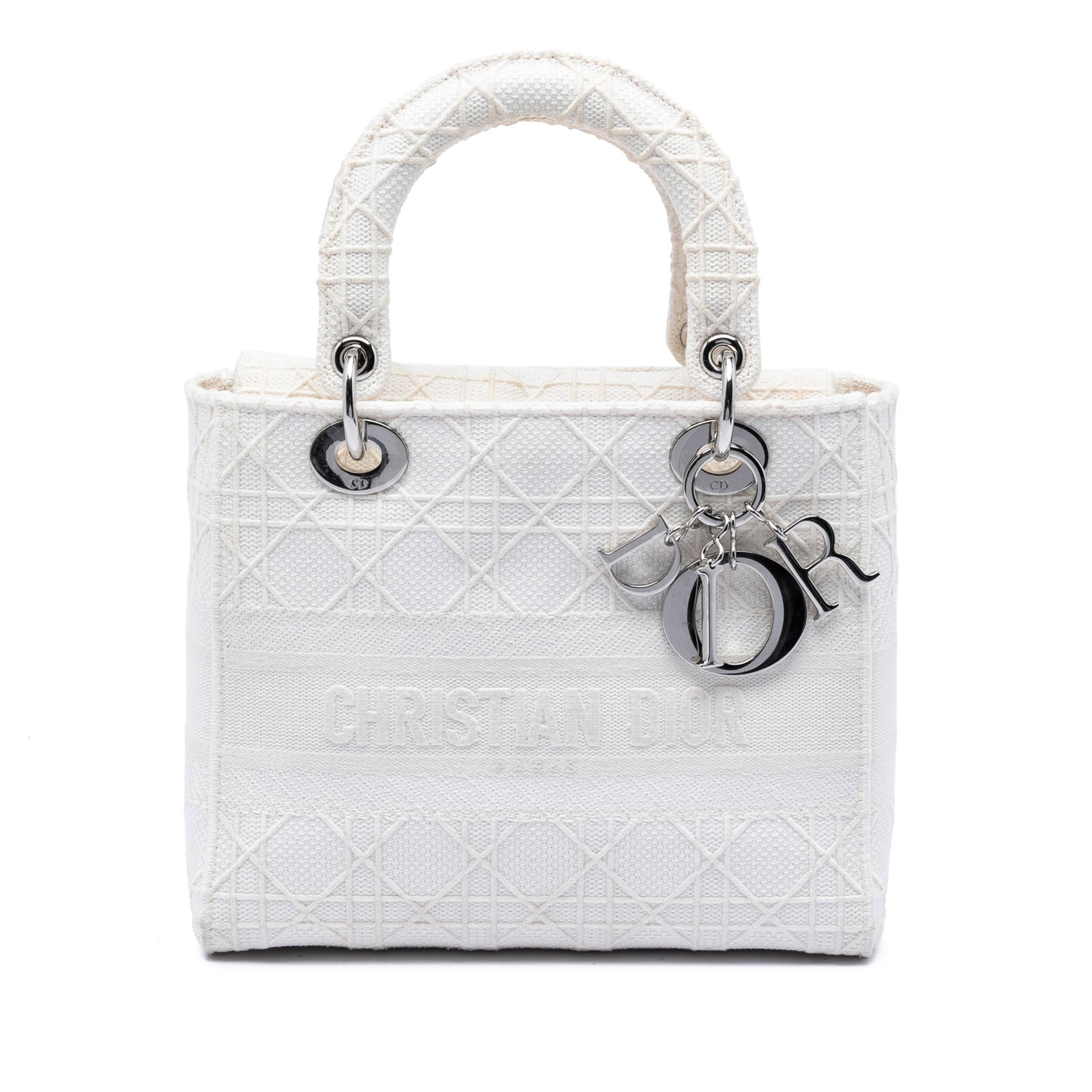 Dior Lady D Lite Medium Cannage Canvas Handbag White: Dior Lady D Lite Medium Cannage Canvas Handbag White Medium Lady D-Lite bag in white canvas with Cannage detailing. This bag features flat handles, a fold-in flap closure, and an interior with zip and