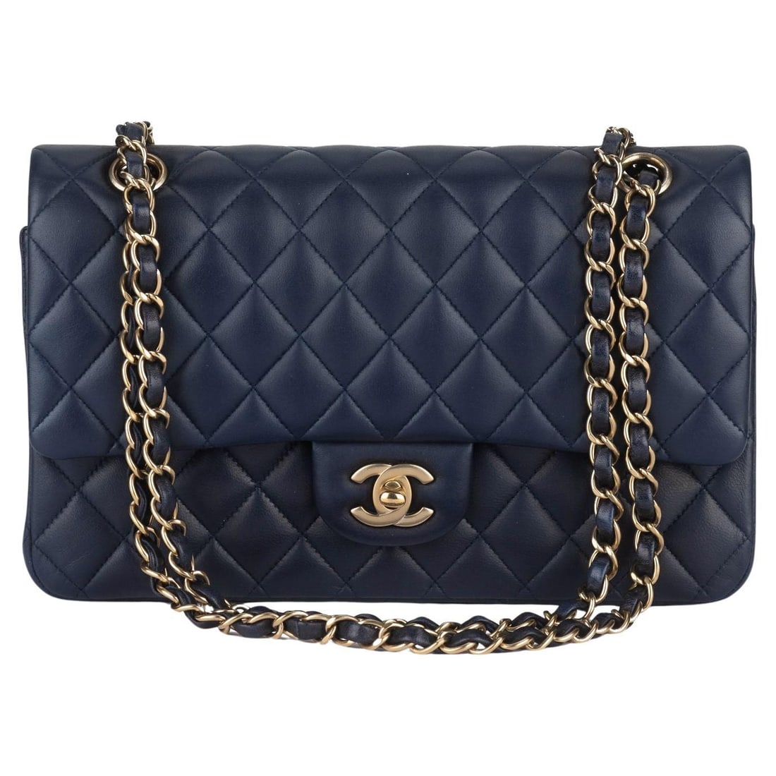 Chanel Navy Blue Lambskin Double Flap Bag with Gold Tone Hardware: Chanel Navy Blue Lambskin Double Flap Bag with Gold Tone Hardware This exquisite Chanel Navy Lambskin Double Flap Bag features a stunning dark blue diamond quilted lambskin leather exterior, complemen