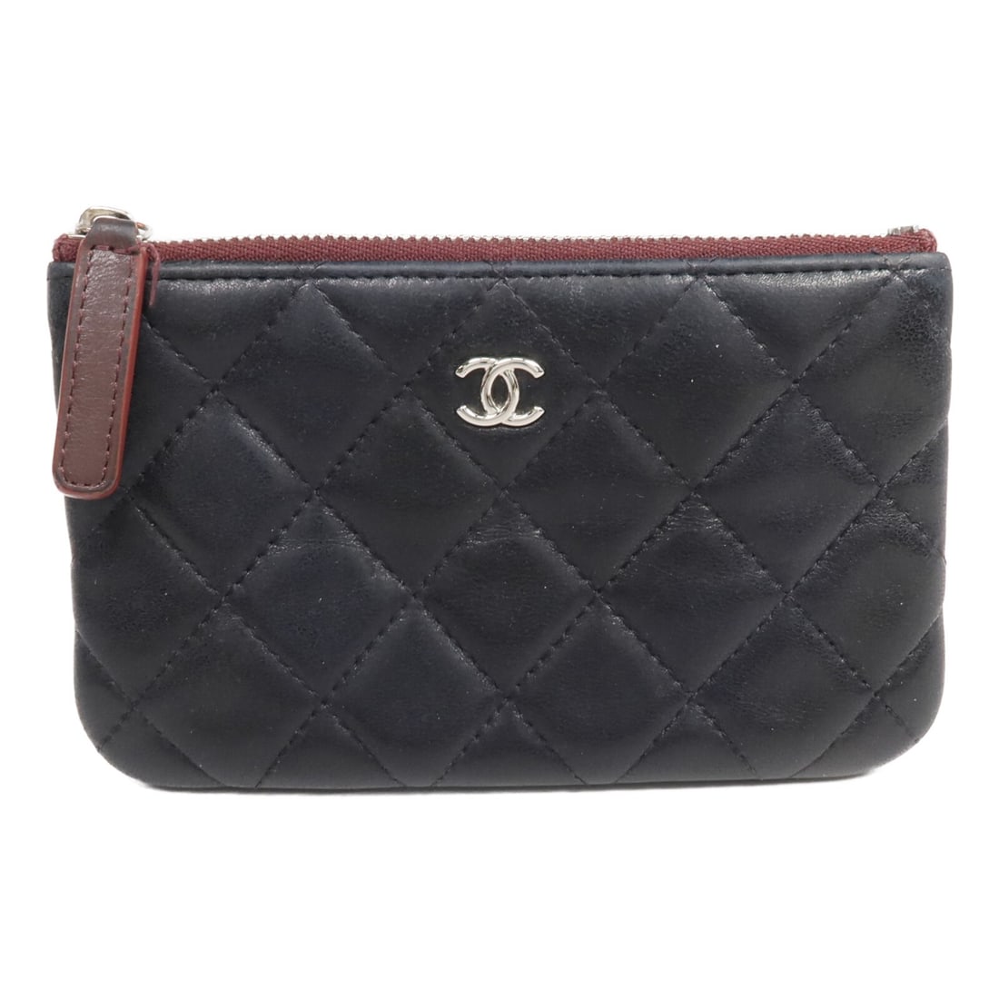 Chanel A82365 CC Mini Clutch Pouch Black Lambskin: Chanel A82365 CC Mini Clutch Pouch Black Lambskin CHANEL CC SHW Mini Pouch Clutch Bag in black lambskin (sheep leather). This women's regular-size clutch is made in France and features a black frame c