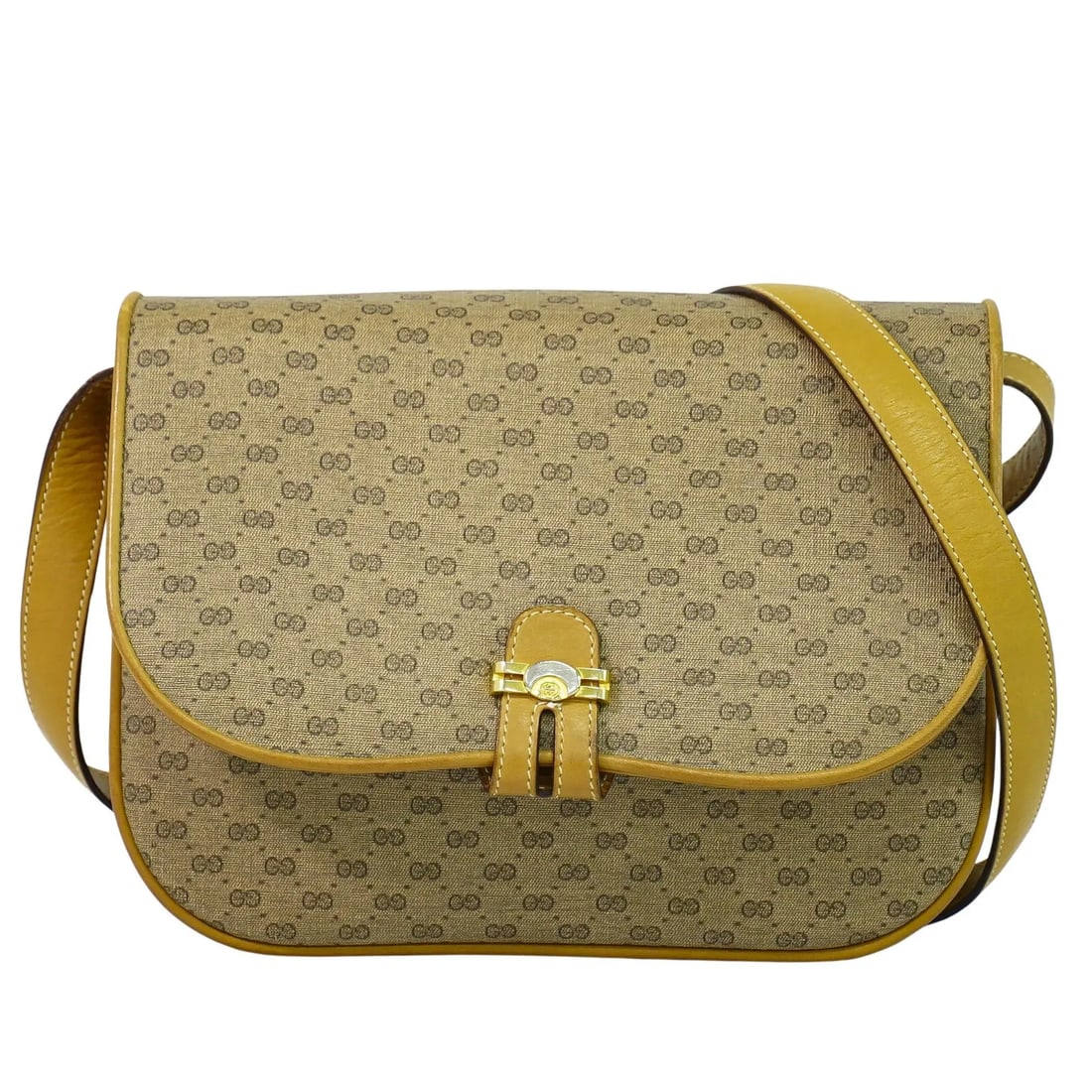 Gucci GG Marmont beige canvas crossbody bag: Gucci GG Marmont beige canvas crossbody bag This Gucci GG Marmont Pouch Crossbody Bag for women features a beige canvas exterior. It is designed for versatile wear and crafted in Italy. The bag shows 