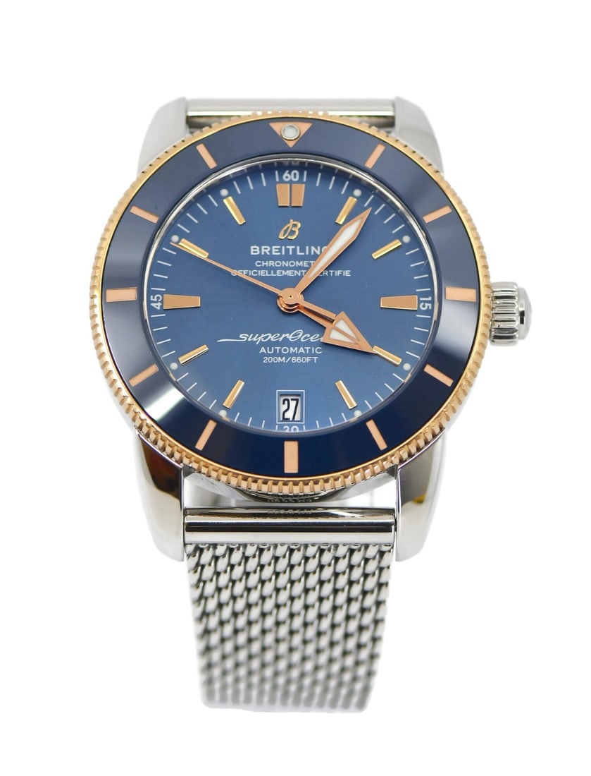 Superocean UB2010 Automatic Wristwatch 18K and Steel Blue Dial 42mm with Box: Superocean UB2010 Automatic Wristwatch 18K and Steel Blue Dial 42mm with Box This Breitling Superocean wristwatch features a polished 42 mm stainless steel case with 18K accents and a blue sunburst di