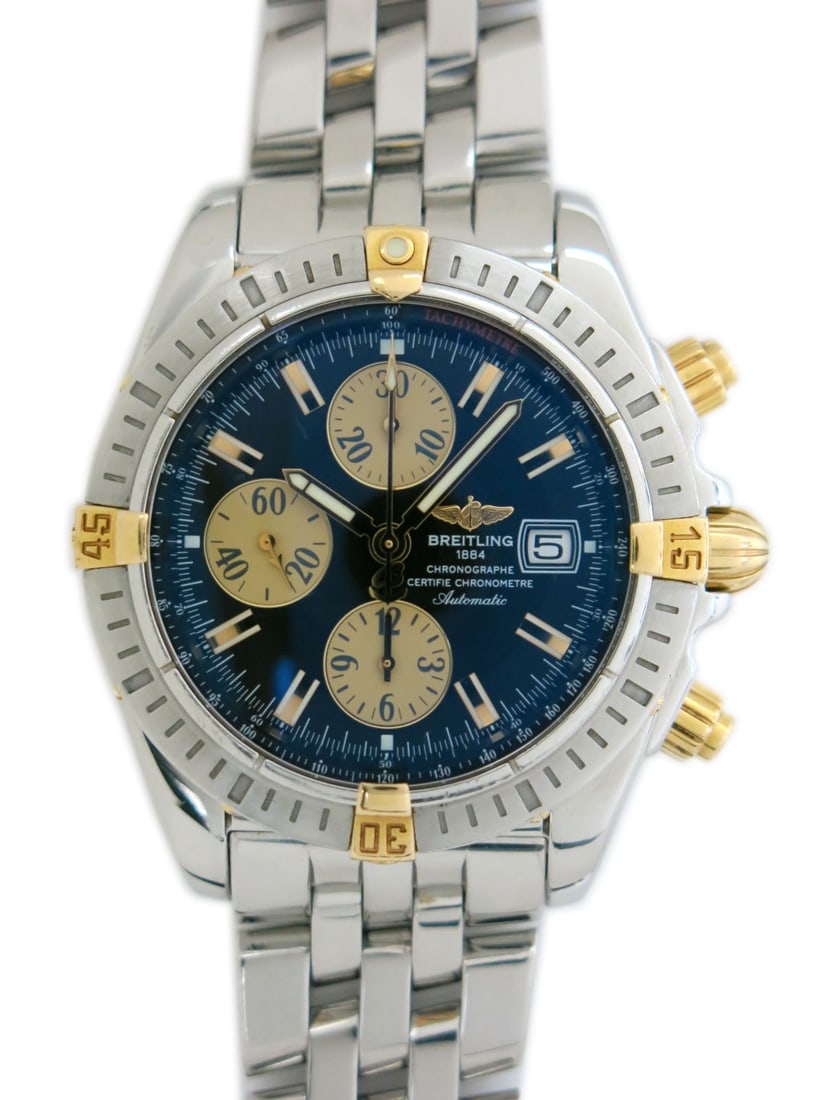 Breitling Chronomat Evolution B13356 mens automatic watch steel gold: Breitling Chronomat Evolution B13356 mens automatic watch steel gold Pre-owned Breitling Chronomat Evolution men's wristwatch, made in Switzerland. It features a black dial, stainless steel and yellow