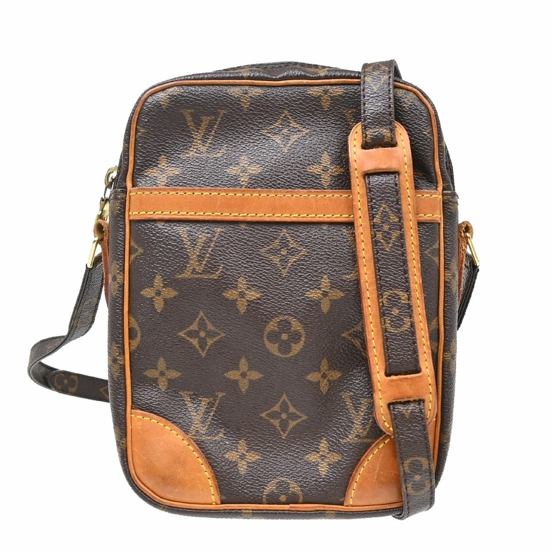 Louis Vuitton Danube Monogram Crossbody Bag M45266 France: Louis Vuitton Danube Monogram Crossbody Bag M45266 France Vintage Louis Vuitton Danube crossbody shoulder bag in brown Monogram canvas with leather trim and an adjustable crossbody strap. The bag feat