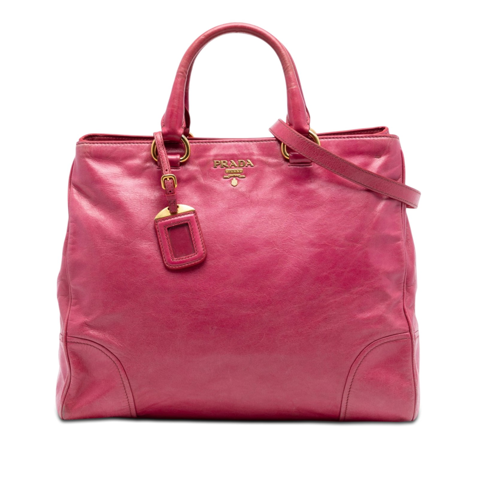 Prada Vitello Shine Pink Leather Top Handle Bag: Prada Vitello Shine Pink Leather Top Handle Bag Prada Vitello Shine satchel in pink leather with rolled leather handles and a flat detachable leather strap. The bag features an open top with a snap bu