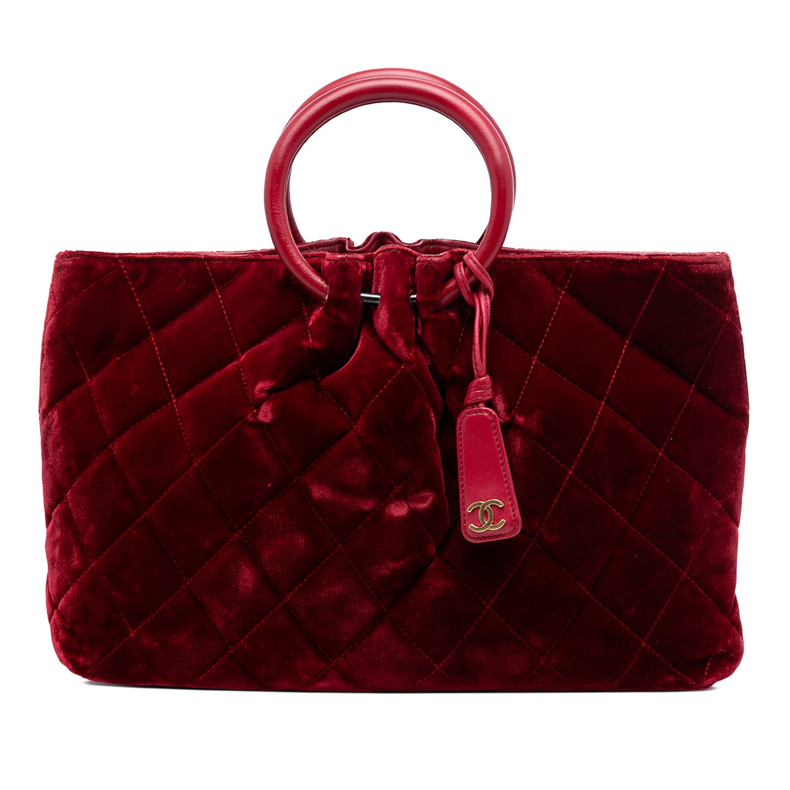 Red Chanel Velvet Quilted Handbag with Circular Leather Top Handle: Red Chanel Velvet Quilted Handbag with Circular Leather Top Handle This Chanel CC Quilted Velvet Top Handle Bag features a quilted velvet body in red, a circular leather top handle, an open top with s