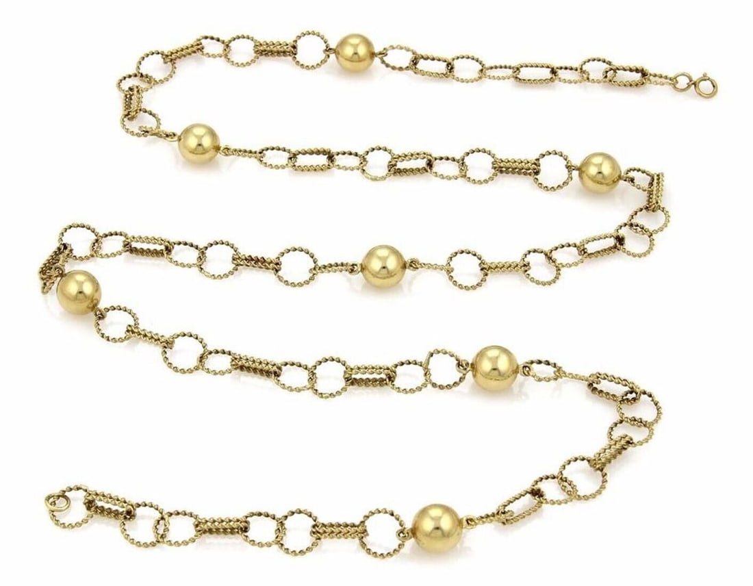 Vintage Estate 14k Yellow Gold Ball Accent Twisted Wire Link Necklace 35": Vintage Estate 14k Yellow Gold Ball Accent Twisted Wire Link Necklace 35" Vintage estate necklace crafted in solid 14k yellow gold with decorative gold ball accents and intricate twisted wire detailin