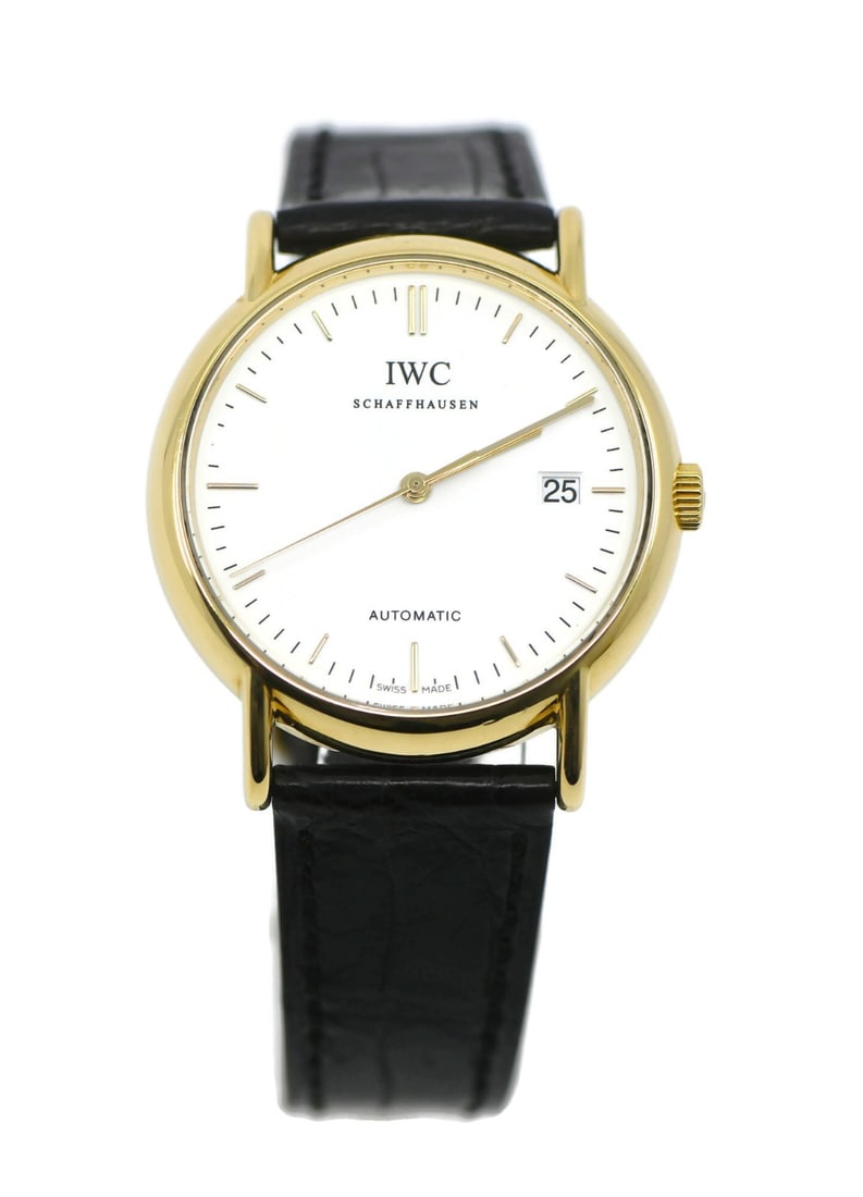 IWC Portofino 18K Yellow Gold Automatic Wristwatch IW925101: IWC Portofino 18K Yellow Gold Automatic Wristwatch IW925101 This IWC Portofino wristwatch features a 38mm case crafted from 18K yellow gold and showcases a classic white analog dial. The watch is powe