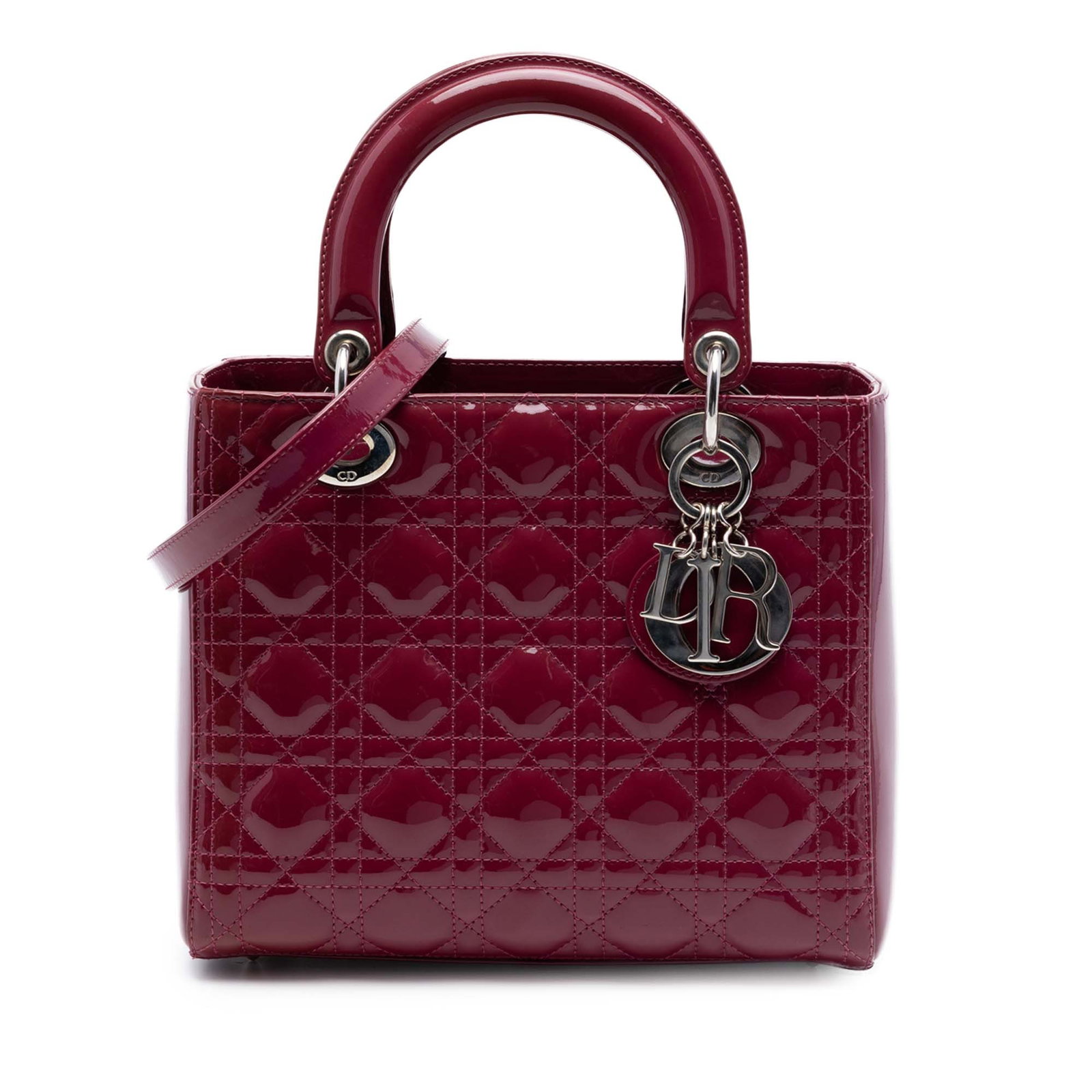 Dior Lady Dior Medium Red Patent Leather Cannage Handbag: Dior Lady Dior Medium Red Patent Leather Cannage Handbag The Medium Patent Cannage Lady Dior is a red bag from Dior, made in Italy. It features a quilted patent leather body, flat leather top handles,