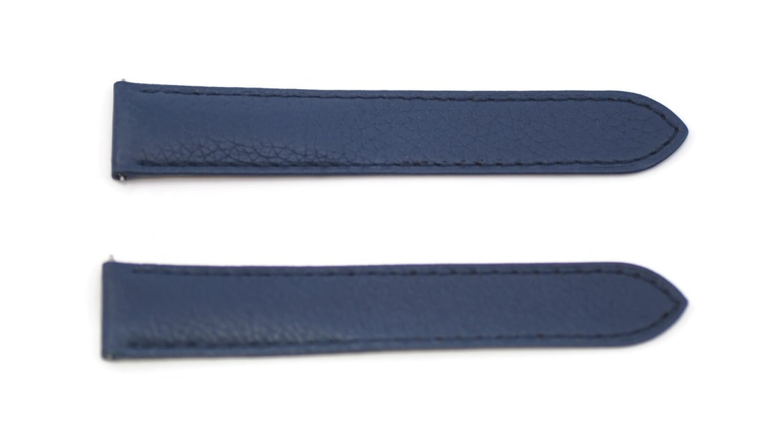 Cartier Authentic Blue Leather Wristwatch Band 18mm: Cartier Authentic Blue Leather Wristwatch Band 18mm This authentic Cartier wristwatch band features a striking blue leather design. With a band width of 18 mm, it is designed to add a touch of eleganc