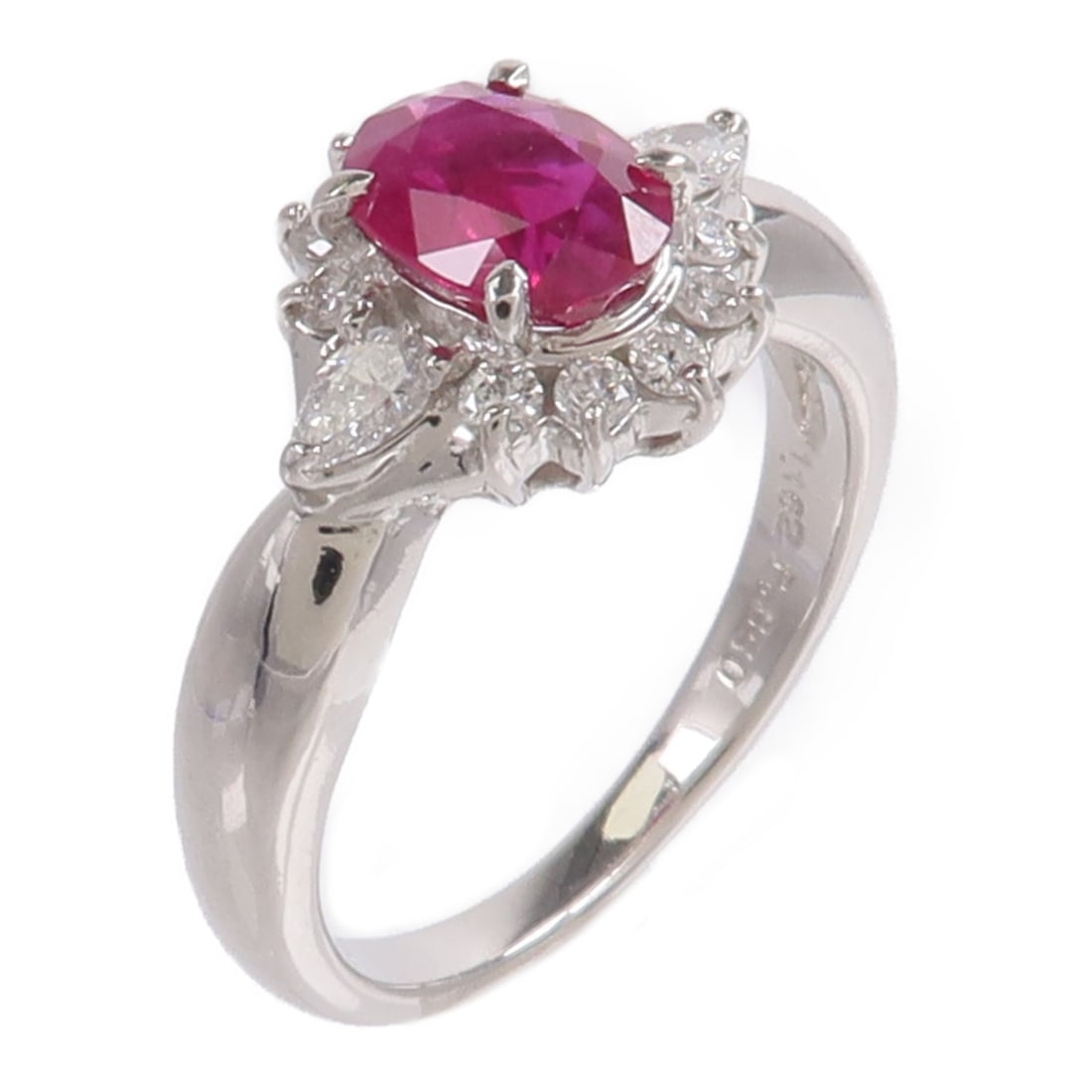 Pt850 Platinum Ruby Diamond Ring Size 5.75 Womens: Pt850 Platinum Ruby Diamond Ring Size 5.75 Womens Ruby and diamond ring in Pt850 platinum, presented in a red colorway. The ring is size 5.75 and features a ruby main stone with diamond accents. It is
