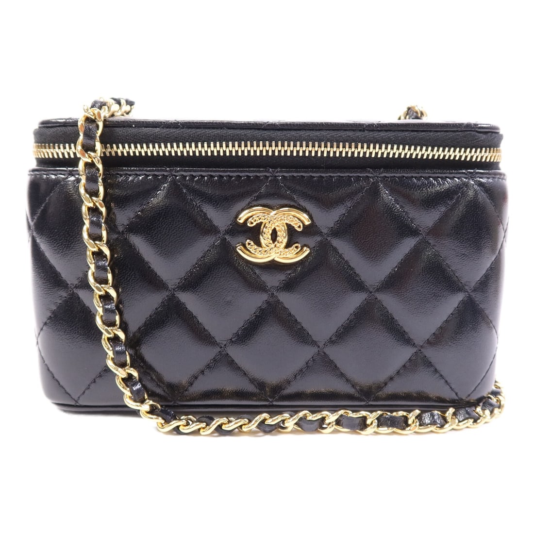CHANEL CC Vanity Case Chain Shoulder Bag Black Waxy Leather: CHANEL CC Vanity Case Chain Shoulder Bag Black Waxy Leather CHANEL vanity case chain shoulder bag in black waxy leather with black frame color and CC GHW details. It is a women's regular-size shoulder