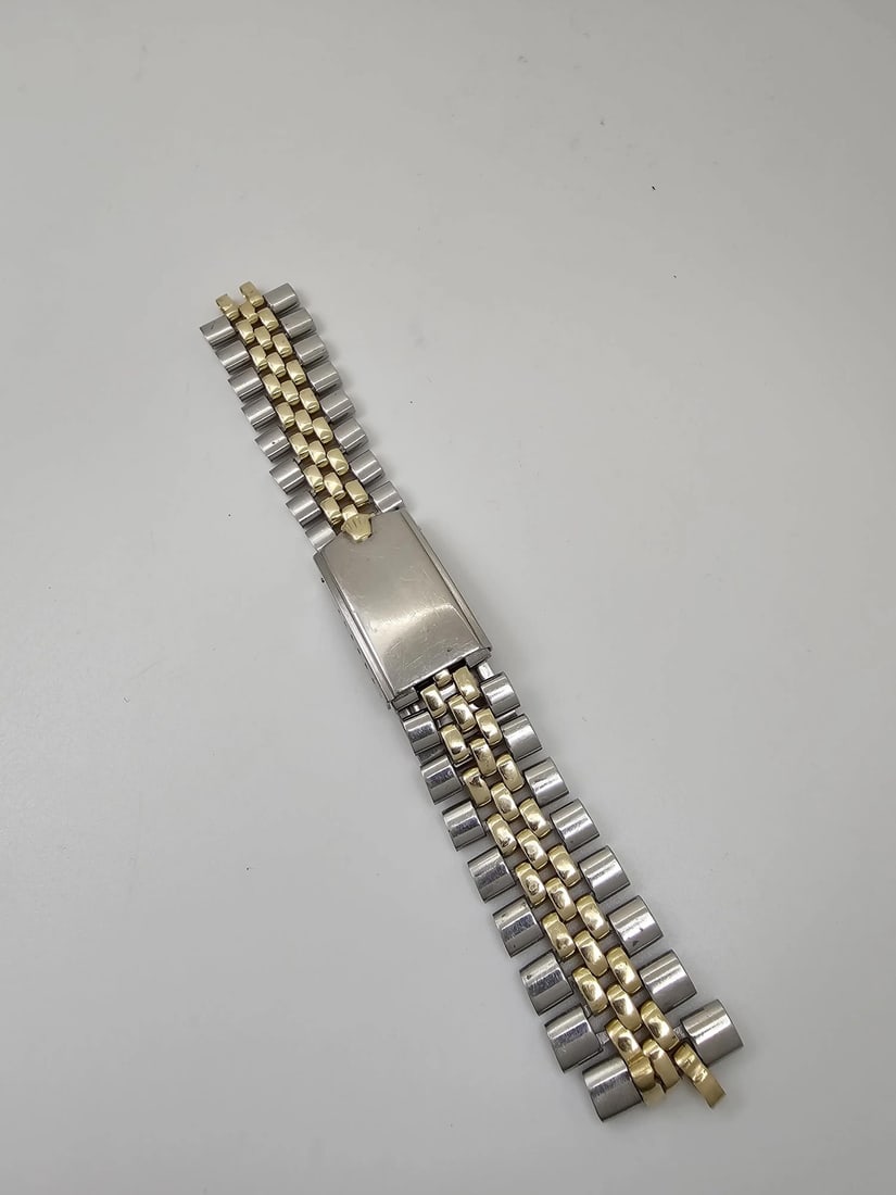 Rolex Datejust 16013 Jubilee bracelet steel 14K gold trim: Rolex Datejust 16013 Jubilee bracelet steel 14K gold trim Pre-owned Rolex Jubilee wristwatch bracelet designed for Rolex Datejust 16013 models. This vintage-style band is made of stainless steel with 