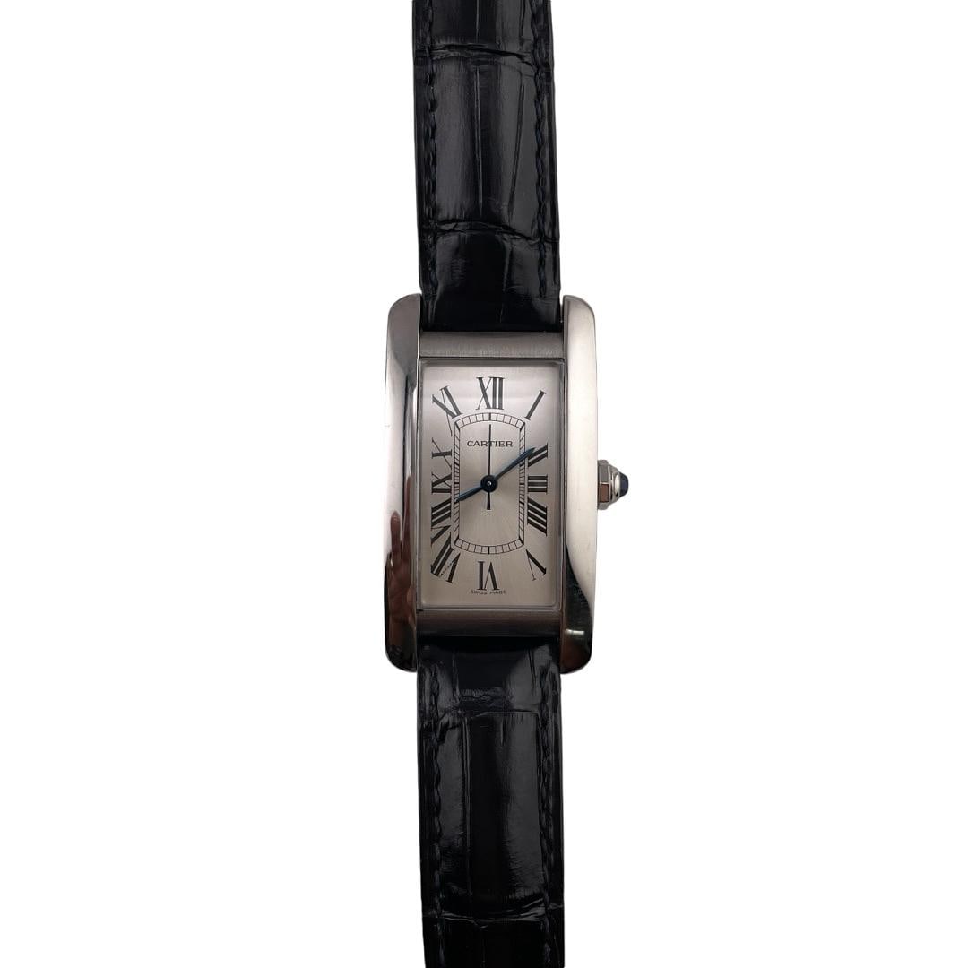 Cartier Tank Americaine WSTA0017 Silver Roman Dial Leather Strap with Card: Cartier Tank Americaine WSTA0017 Silver Roman Dial Leather Strap with Card This Cartier Tank Americaine watch features a refined silver Roman dial paired with a classic leather bracelet. Identified by