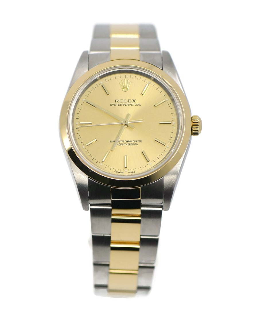 Rolex Oyster Perpetual 14203M Automatic 18K Steel Wristwatch with Box: Rolex Oyster Perpetual 14203M Automatic 18K Steel Wristwatch with Box This Rolex Oyster Perpetual wristwatch features a refined combination of 18K gold and stainless steel, offering a classic and eleg