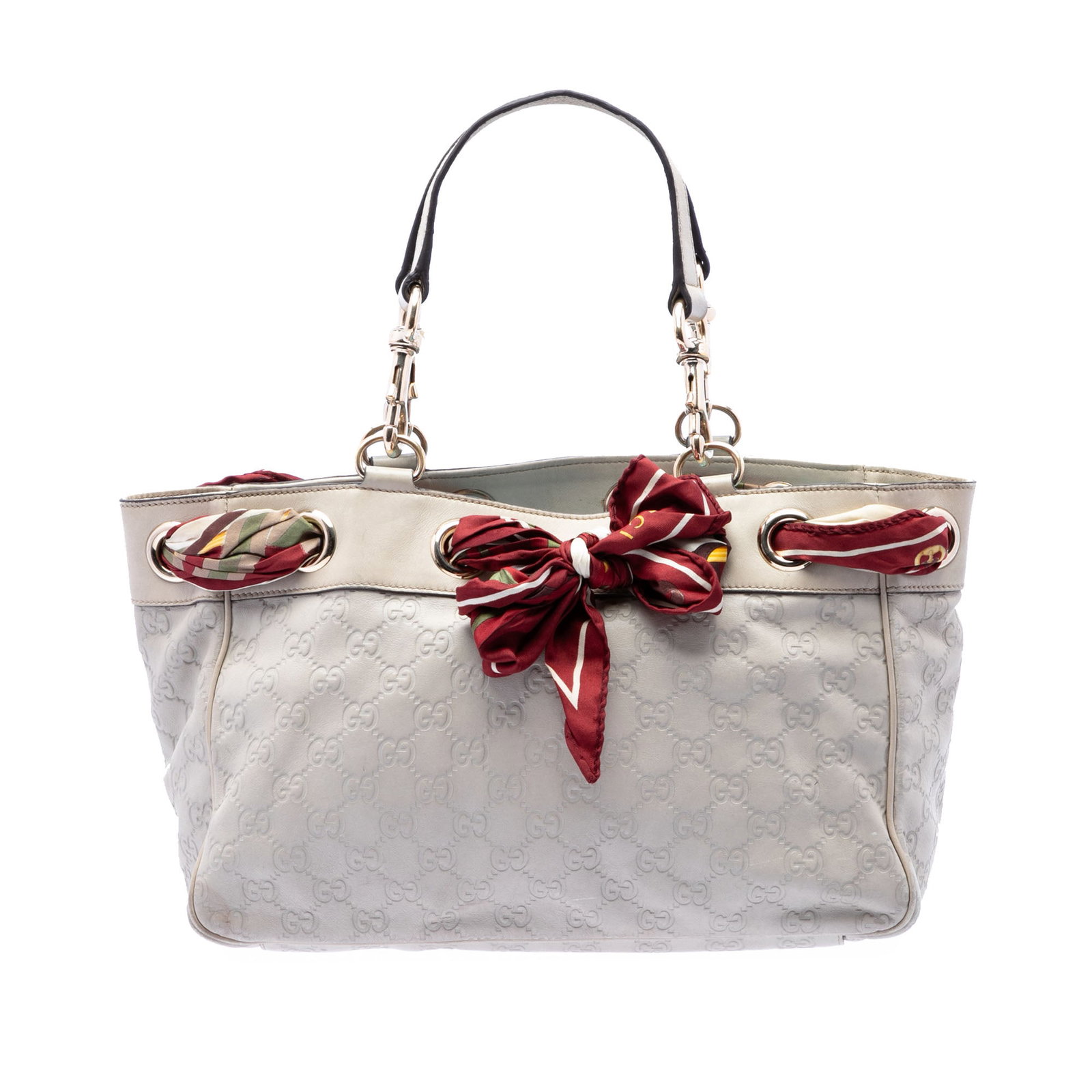 Gucci Positano Medium Guccissima Leather Tote Bag White: Gucci Positano Medium Guccissima Leather Tote Bag White This Gucci Medium Guccissima Positano Tote is crafted in embossed leather with flat leather straps, a drawstring closure, and interior zip and s