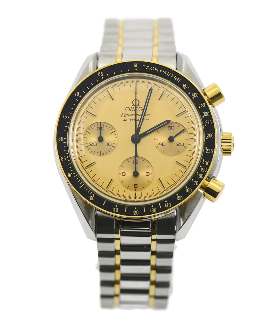 Omega Speedmaster 175.0032 men's automatic wristwatch box papers: Omega Speedmaster 175.0032 men's automatic wristwatch box papers Omega Speedmaster Reduced wristwatch in 18K and stainless steel, reference 175.0032. It features a champagne dial, analog display, and 