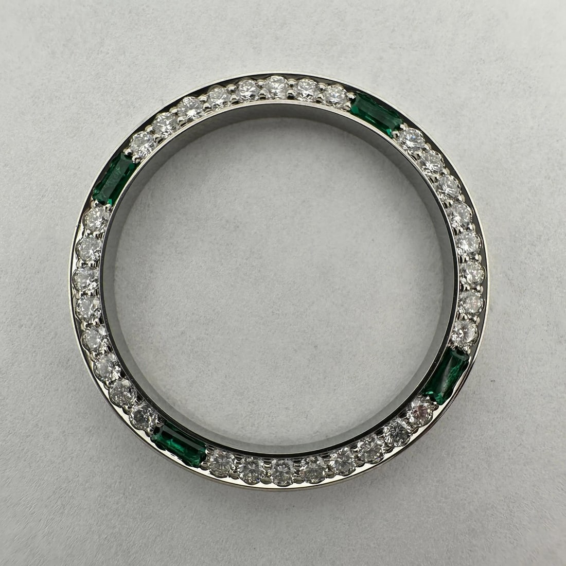 Custom 0.64ct Diamond Bezel for Rolex Datejust 26mm Luxury Upgrade: Custom 0.64ct Diamond Bezel for Rolex Datejust 26mm Luxury Upgrade Elevate your watch with this luxurious custom diamond bezel, featuring 0.64 carats of sparkling diamonds set in a sleek steel design.
