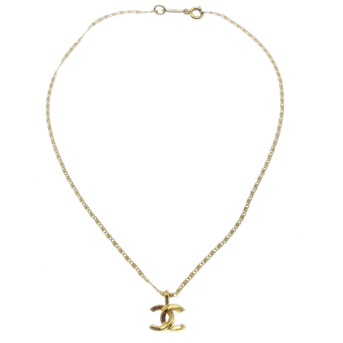 1982 Chanel CC Charm Necklace Gold Plated Mini Pendant: 1982 Chanel CC Charm Necklace Gold Plated Mini Pendant Vintage Chanel charm necklace featuring a gold-plated CC pendant on a chain. Made in France, this 1982 piece has a classic logo design and shows 