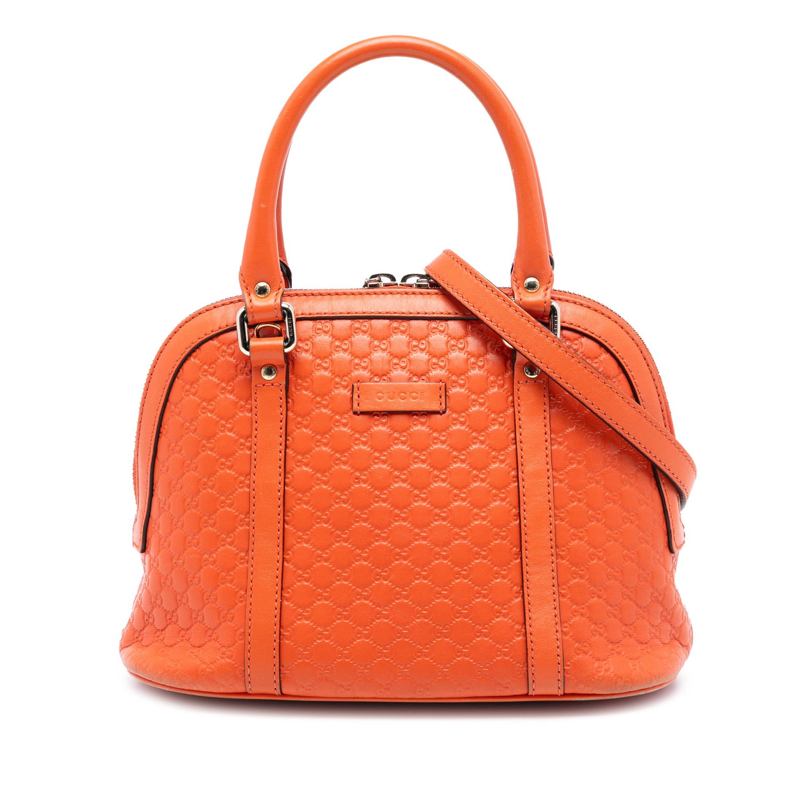 Gucci Mini Microguccissima Orange Leather Dome Satchel with Strap: Gucci Mini Microguccissima Orange Leather Dome Satchel with Strap This Gucci Mini Microguccissima Dome Satchel features an orange leather body with the signature Microguccissima pattern, rolled leathe