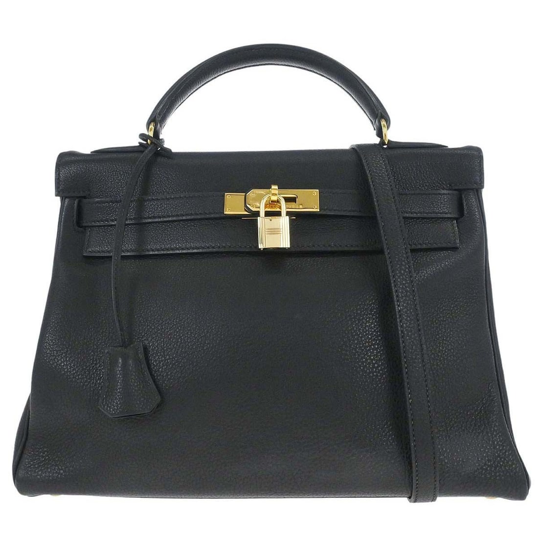 Hermes Kelly 32 Retourne Black Togo Leather Top Handle Bag: Hermes Kelly 32 Retourne Black Togo Leather Top Handle Bag Hermes Kelly 32 Retourne 2-way handbag in black Togo leather with a top handle, detachable shoulder strap, turn-lock flap closure, black leat