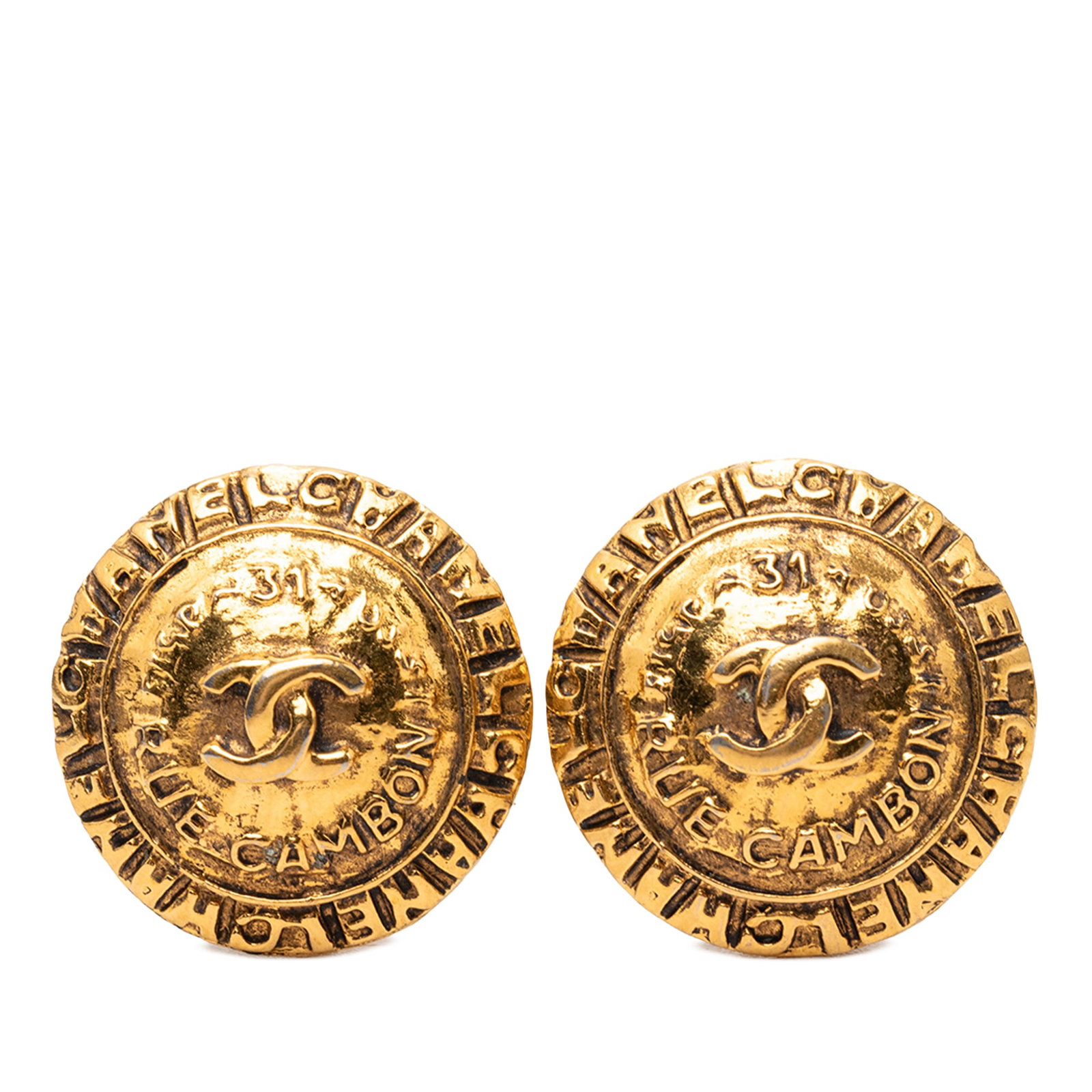 Chanel Rue Cambon CC Round Clip On Gold Plated Earrings: Chanel Rue Cambon CC Round Clip On Gold Plated Earrings Round clip-on earrings featuring a gold plated metal body with the CC Rue Cambon design. Made in France, this costume jewelry pair shows visible