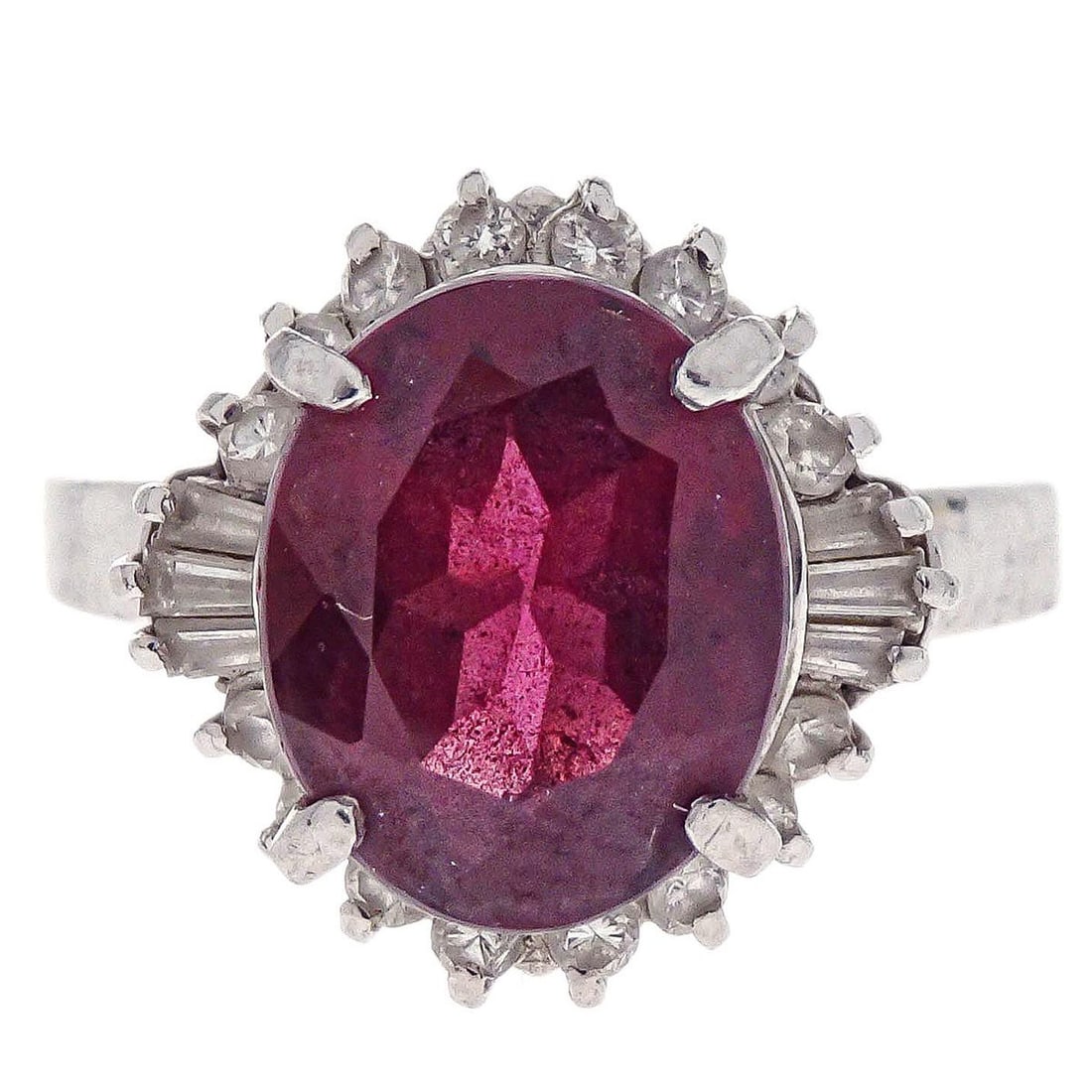 Vintage Pt900 Platinum Ring with Garnet and Diamond Size 53: Vintage Pt900 Platinum Ring with Garnet and Diamond Size 53 Vintage no-brand ring crafted in Pt900 platinum with a round garnet accented by diamonds. This ring has a silver-tone appearance and remains