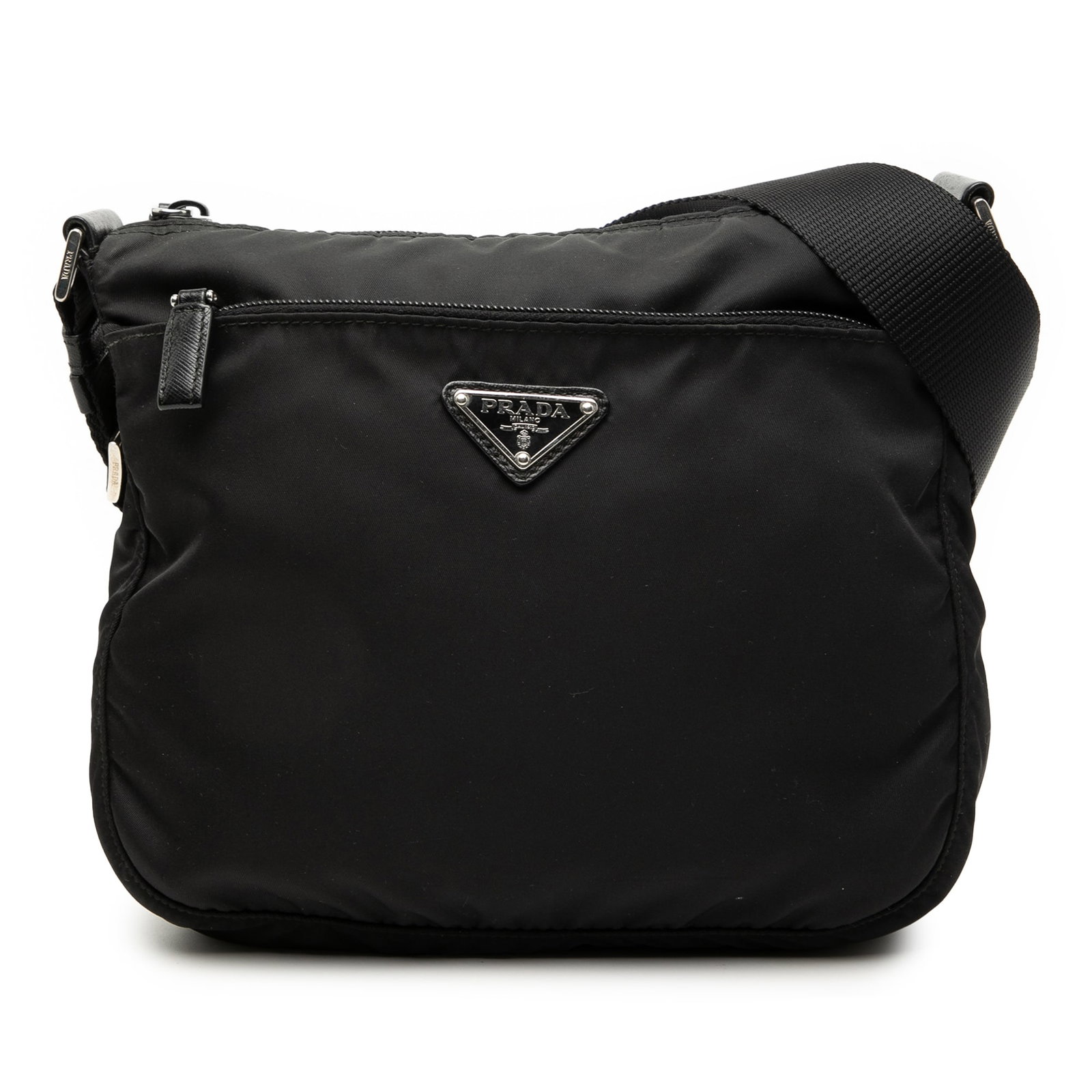 Black Prada Tessuto Nylon Crossbody Bag with Adjustable Strap: Black Prada Tessuto Nylon Crossbody Bag with Adjustable Strap This Prada Tessuto Zip Top Crossbody bag is crafted from black nylon fabric and features a flat adjustable strap, a top zip closure, a fro