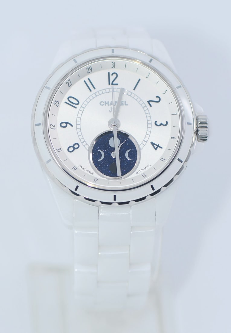 Chanel J12 Moonphase White Ceramic Watch Ref H3404 Authentic: Chanel J12 Moonphase White Ceramic Watch Ref H3404 Authentic The Chanel J12 Moonphase White Ceramic Watch H3404 is a luxurious wristwatch crafted from high-quality white ceramic. This elegant timepiec