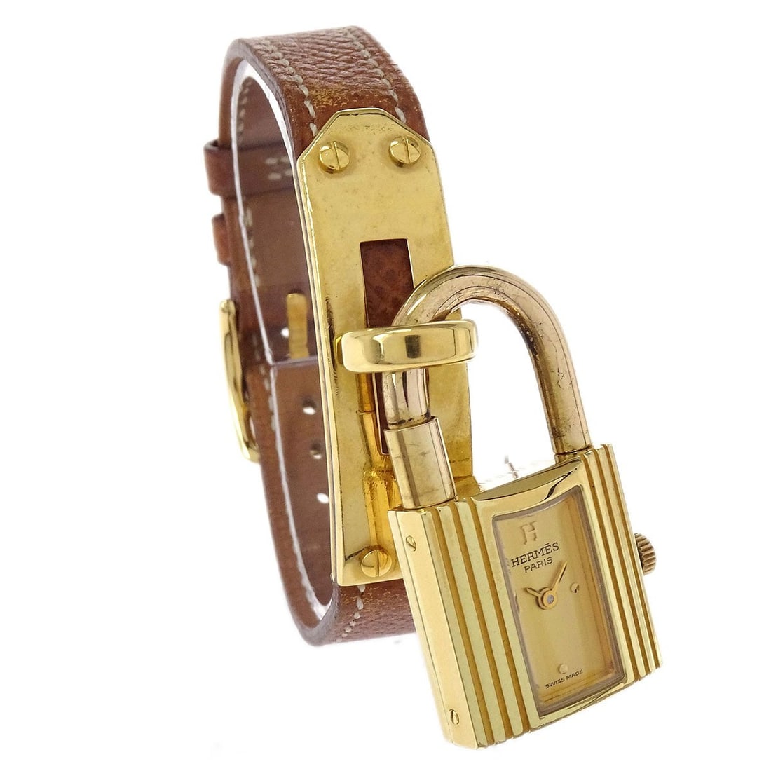Womens Hermes Kelly wristwatch gold plated quartz leather band: Womens Hermes Kelly wristwatch gold plated quartz leather band Hermes Kelly quartz wristwatch in a dress/formal luxury style, designed for women. It features a gold dial, gold case and bezel, gold ban