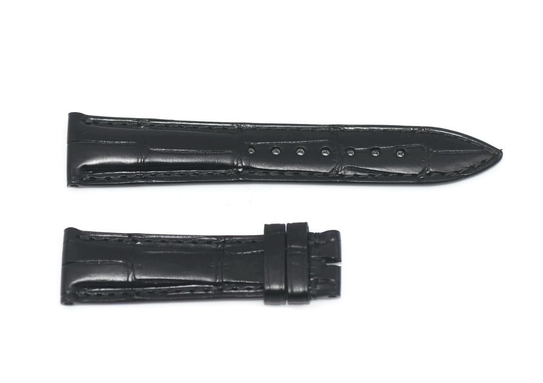 Authentic Ulysse Nardin Black Leather Watch Strap 19mm: Authentic Ulysse Nardin Black Leather Watch Strap 19mm Enhance your wristwatch with this authentic Ulysse Nardin black leather strap. Crafted from high-quality leather, this strap combines style and d