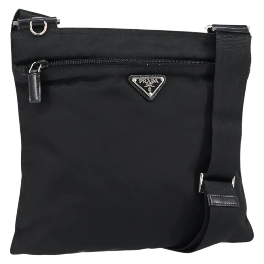 Prada Nylon Messenger Bag with Front Pocket in Black: Prada Nylon Messenger Bag with Front Pocket in Black This Prada Front Pocket Messenger Bag is crafted from durable black nylon and designed for unisex use. Featuring a front pocket for easy access and